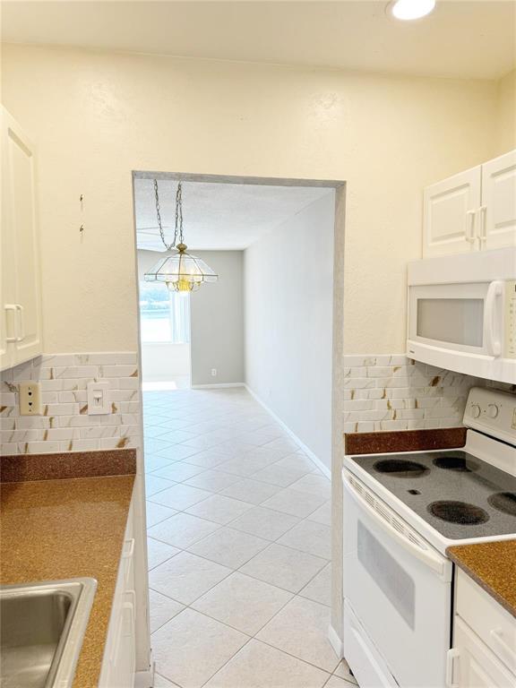 LEISUREVILLE LAKE CONDO - Residential