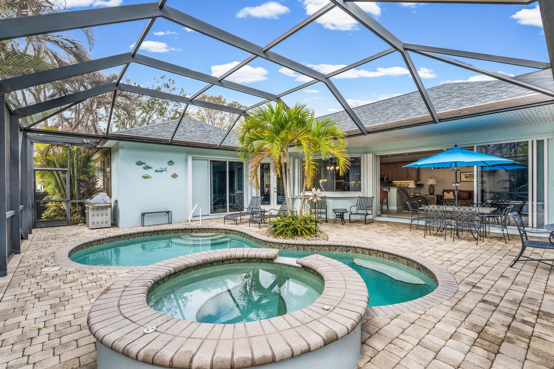 Set amongst the oaks with Hammock Lake view & sunset skies! Gorgeous courtyard style home w. separate cabana BR. Roof - 2025, re-piped -2025, WH- 2020, granite kitchen, malachite marble MBR bath, central vac, surround sound, expansive lanai plus screened porch...and more! Vacation at home w. golf, pickleball & fitness ctr. Social membership required. Lots of TLC & ready for quick move in!