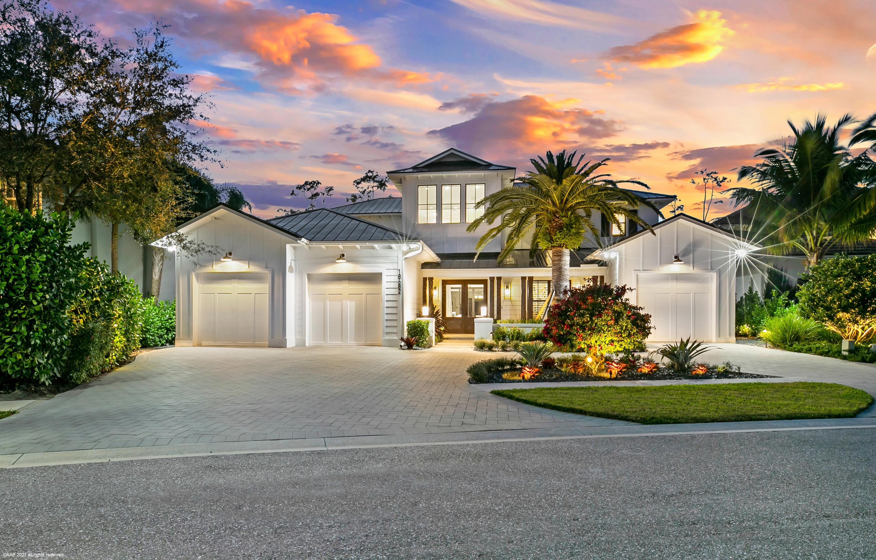Coastal masterpiece nestled on the Loxahatchee River in the desirable gated community of Old Cypress Pointe, a small 13 lot subdivision with 5 homes on the River. This beauty was built in 2019 and its spacious layout offers 4 bedrooms (2 are master suites, 1 upstairs & 1 downstairs), 4 1/2 baths and 3-car garage. Features of this impeccable detail-oriented home include: large great room with custom ceiling and entertainment center; chef's kitchen with a huge preparation island, custom cabinetry, quartz countertops, butler's pantry & stainless steel appliances; den, loft & craft rooms and hardwood floors & impact glass throughout. Exterior features include: metal roof; circular driveway; generator; spacious covered patio with summer kitchen & phantom screens; large covered balcony overlooking the pool and river; beautiful landscape lighting and a preserve with dock which comes equipped with a dock box & small floating platform.