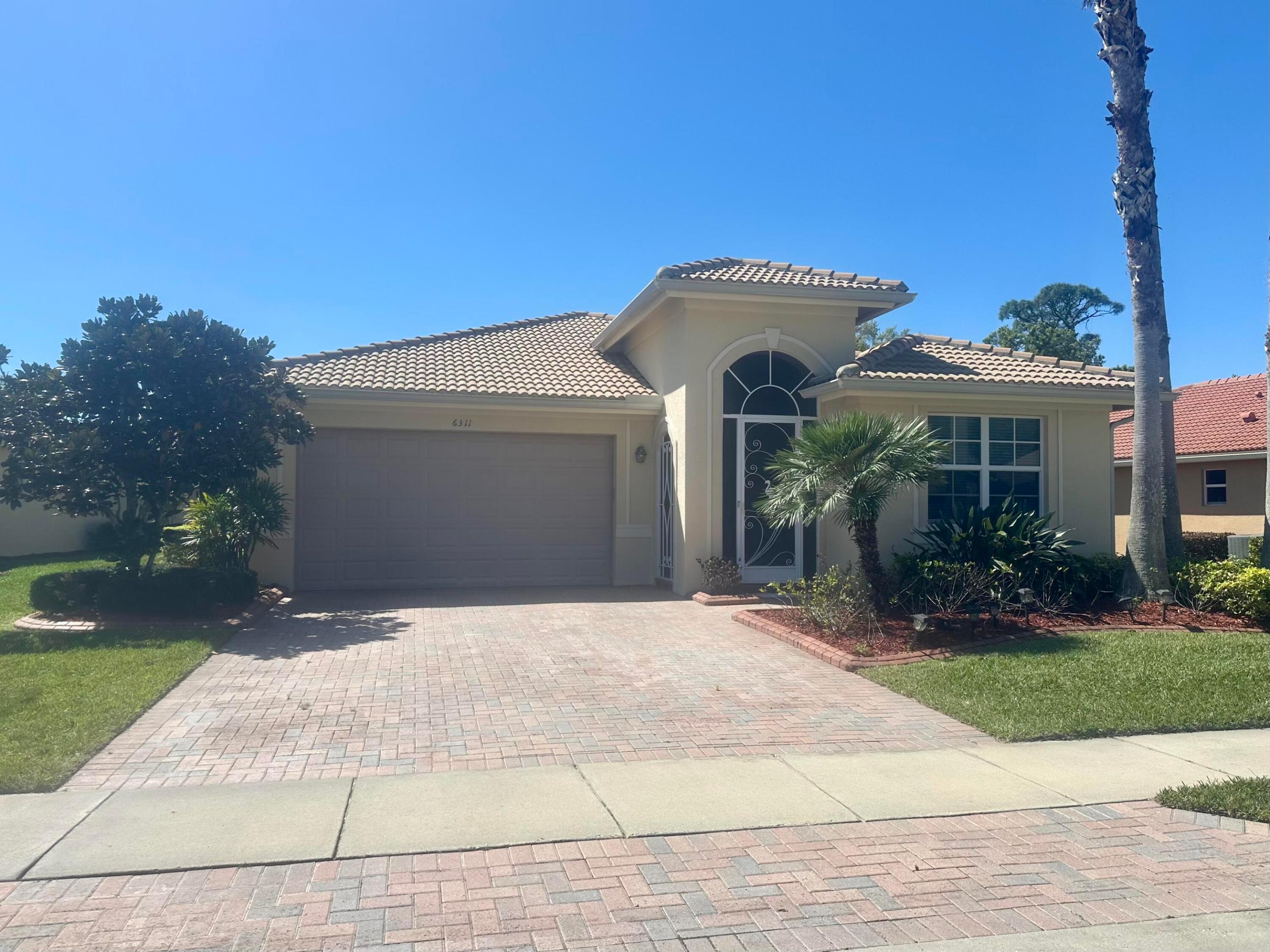 Welcome to this well-appointed 3-bedroom residence situated in Woodfield PD Phase 3 in Vero Beach, Florida. Offering 2,218 square feet of finished living space, this home provides comfortable proportions for everyday living and entertaining. The two-car garage offers convenient parking and storage solutions. Located in the established Woodfield PD Phase 3 community, this property presents an excellent opportunity for those seeking a solid home in the Vero Beach area.