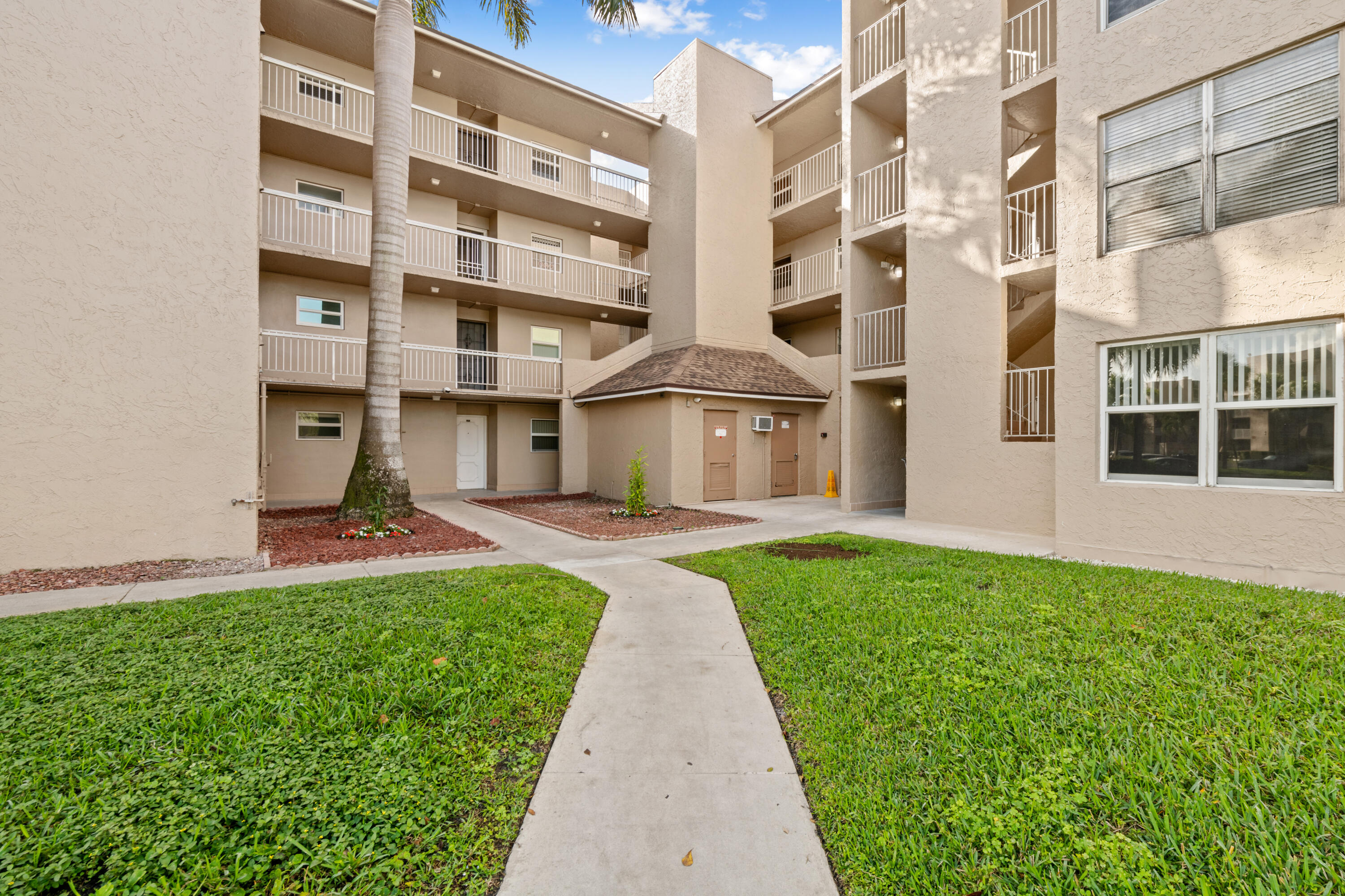 SELLER WILL PAY 1ST  YEAR OF HOA FEES IN ADVANCE FOR BUYER. Take advantage of this  2-bedroom, 2-bath condo located in the highly desirable Pine Island Ridge community of Davie. The spacious living and dining areas flow to an enclosed porch perfect for relaxing with golf course and water views. Enjoy resort-style living with access to the private country club, golf, tennis, pickleball, gym, restaurants, walking trails and more. Centrally located near Nova Southeastern University, Broward College, major highways, walkable distance to shopping and dining. Assigned prime parking right in front of unit.  Easy to show.