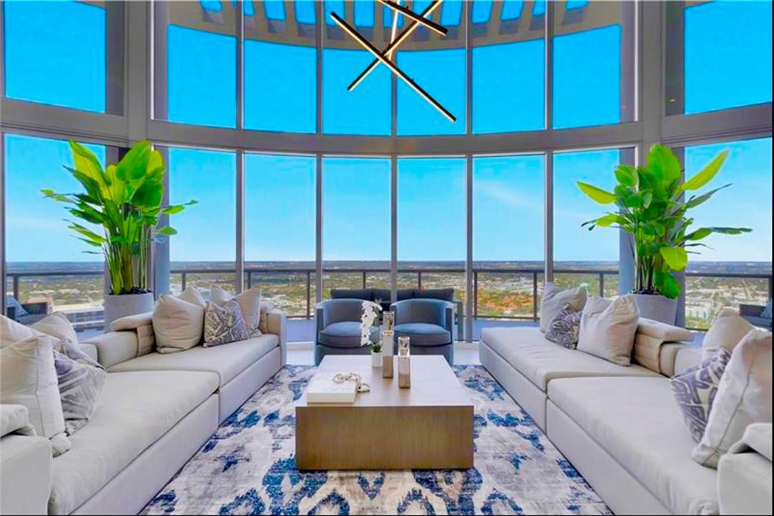FORT LAUDERDALE'S HIGHEST LEVEL TWO STORY PENTHOUSE WITH SOARING CEILINGS. Exquisite opportunity to own the highest residential address in the city of Fort Lauderdale. Perched high atop the 100 Las Olas luxury condominium, the 45th/46th levels define this unparalleled residence which is being offered furnished. Upon entry to the foyer, you pass the suspended staircase, then are greeted by the dramatic 22' ceilings of the great room. Chefs kitchen with commercial grade appliances and temp controlled wine storage, dual dishwashers and much more. The primary level offers you the owners retreat as well as staff quarters and lower level utility. Three expansive terraces between the two levels offer you both ocean and New River views. Life on the iconic Las Olas Blvd has never been more ideal. This gracious residence is fully furnished and appointed. Interior utility rooms on both levels as well as residence access on both levels which is ideal for larger families. Upstairs loft/office also has access to an additional wetter with refrigerator. Family room is appointed with wet bar and mini refrigerator. Additional temp controlled storage as well as premium assigned parking are just a few of the luxuries included in this amazing offering. The residences of 100 Las Olas enjoy private amenities as well, including 24 hour concierge, state of the art fitness center, heated pool with private cabanas,  The 100 Las Olas sits atop the award winning Hyatt Centric property with premium dining and entertainment within steps of the property. From Fogo de Chao, Eddie V's, to strolling along the New River with the mega yachts navigating the waterways, its truly the most serene place in the city to reside.