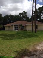 This home has been just given a fresh interior and exterior coat of paint. Great interior design.  Perfect for the owner who needs substantial garage space. The home has a 900 square foot detached garage and a two car attached garage. Make your appointment before it is too late.