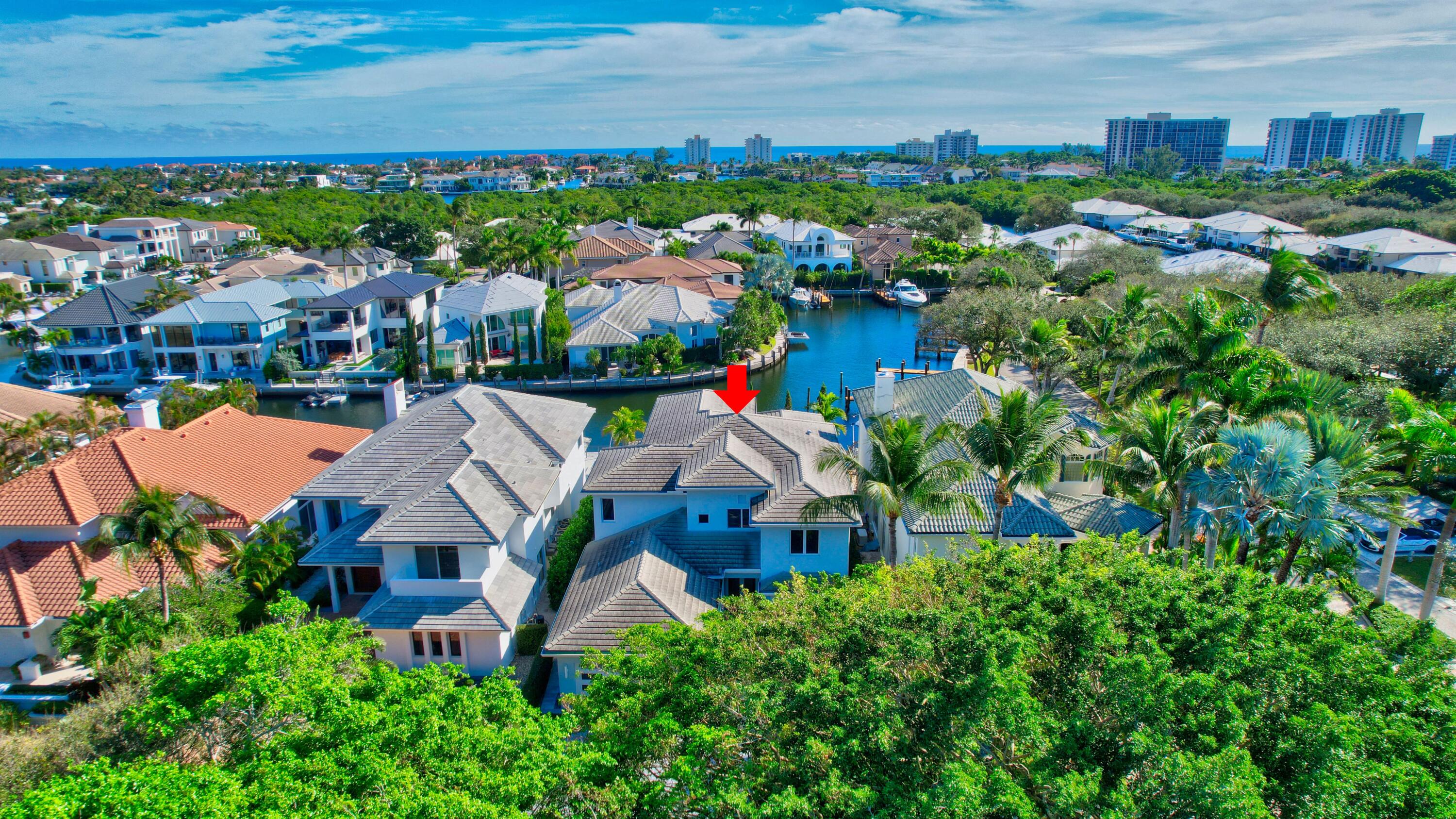 Nested in the exclusive Boca Marina Yacht Club, this east exposure waterfront estate offers long water views and 57 feet of private dockage on the canal with direct ocean access. This modern designer decorated residence features five generously sized bedroom suites including the master and office suites on the first floor, high ceilings, chef's kitchen with Thermador/Miele appliances and wet bar entertainment area. Alfresco outdoor kitchen, heated saltwater pool and cabana bath make this property perfect for Florida living and work. Equipped with manned gate, interior and exterior security system and cameras, hurricane windows and doors, Control 4 smart home system. Perfect location with access to best schools restaurants, entertainment, and country clubs.