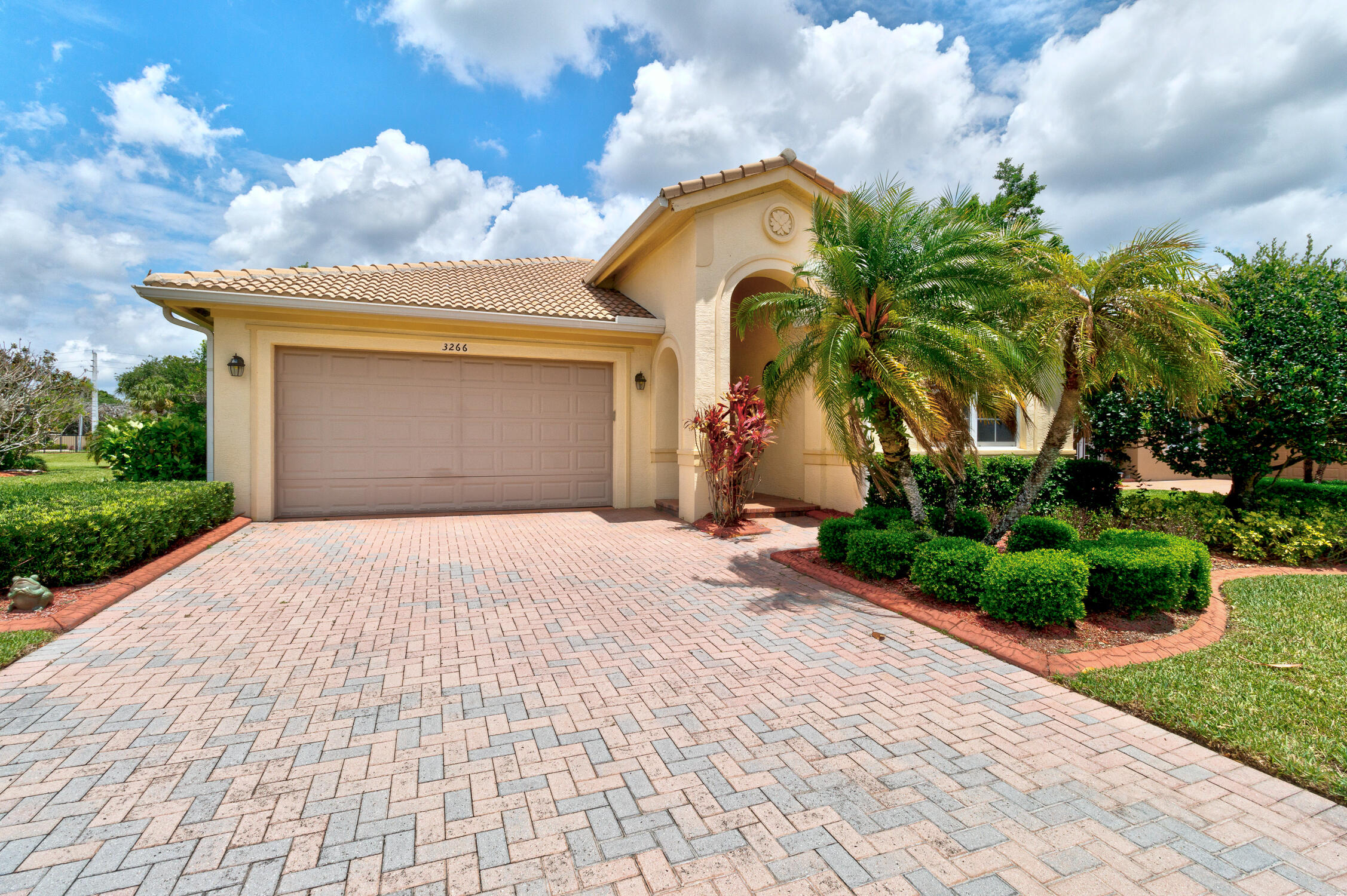 Nestled in the highly sought-after 55+active Woodfield community, this beautifully maintained 3/2/2 offers the perfect blend of comfort, style and easy Florida living.  The spacious open layout and large kitchen design makes this home ideal for both relaxing and entertaining.  Step outside to the extended screened lanai to enjoy the sweeping backyard views - a serene setting with plenty of room to unwind.  The Clubhouse offers a full social calendar of events, heated pool & spa, fitness center, tennis, bocce ball, mitigated pickleball and game room.  Minutes away from Vero's beautiful beaches.