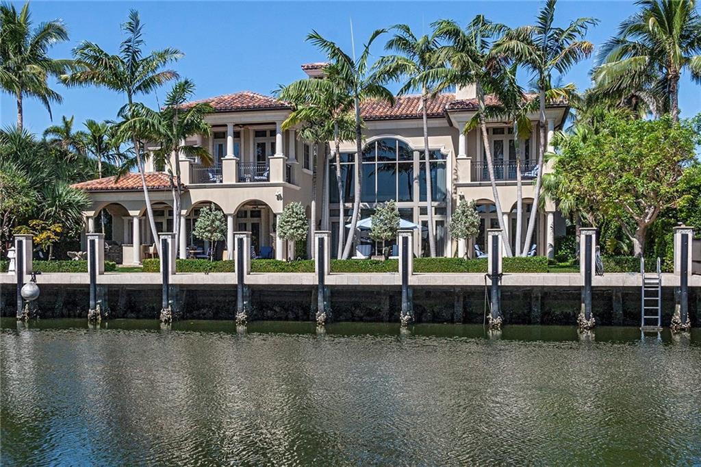 PRICED BELOW REPLACEMENT VALUE! This extraordinary custom deep water residence offers unusually open entertaining areas & sophisticated transitional styling. Desirably located on one of the finest Las Olas Isles (all underground utilities). Custom Bomar built with no detail or expense spared. Hand selected craftsman quality materials & rare finishes throughout. The floor plan includes a beautiful 1st level VIP Suite, library/media room, open living & dining rooms, Chef's kitchen. 2nd level ultra-luxurious Master, expansive Bedroom Suites. Smart House technology, impact glass & generator. Beautiful covered outdoor living room with fireplace. Resort style pool.Surrounded by other multi-million dollar residences. DOCK UPTO 80FT YACHT WITH 9FT +/- DRAFT - one of  most popular isles for boaters