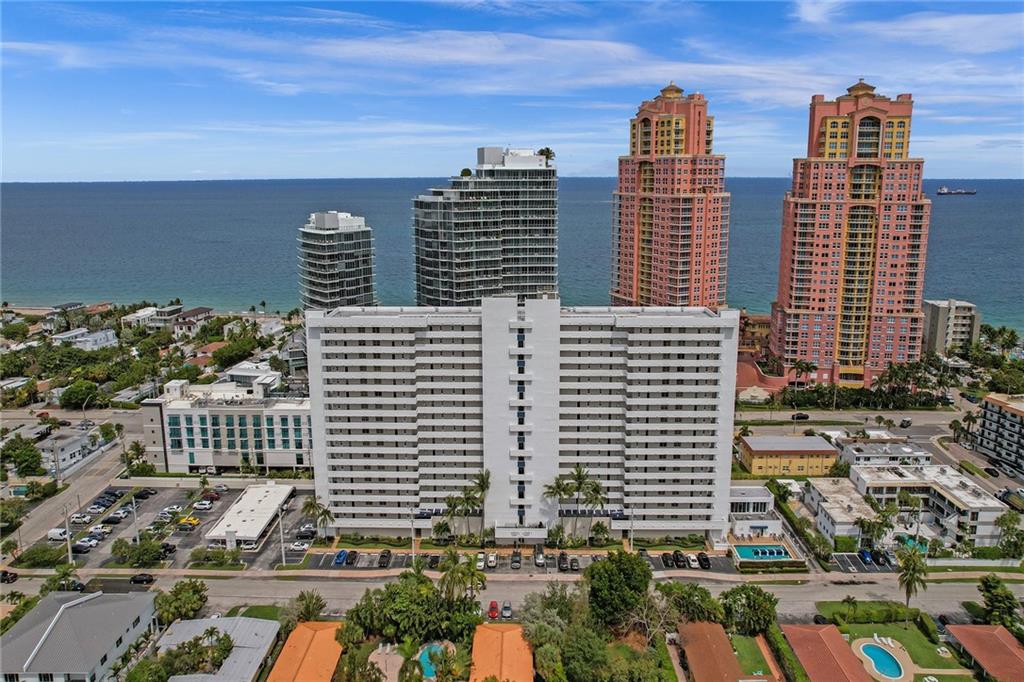 Perfectly situated 1 bedroom, one and half baths with beautiful ocean views.  Your perfect beach hangout.  Walk to the beach, to Birch State park with privileged access, a new Publix (under construction), and a selection of fine dining options. Complete turnkey including dishes, cooking utensils, flatware, linens, towels, art, accessories, and an electric scooter. Toothbrushes provided on move in. All complimented by 24-hour security, newly renovated lobby, a new gym, sauna, heated pool, club room with balcony that includes grill and picnic tables overlooking the pool. Come enjoy the lifestyle and energy of condo living by the beach.