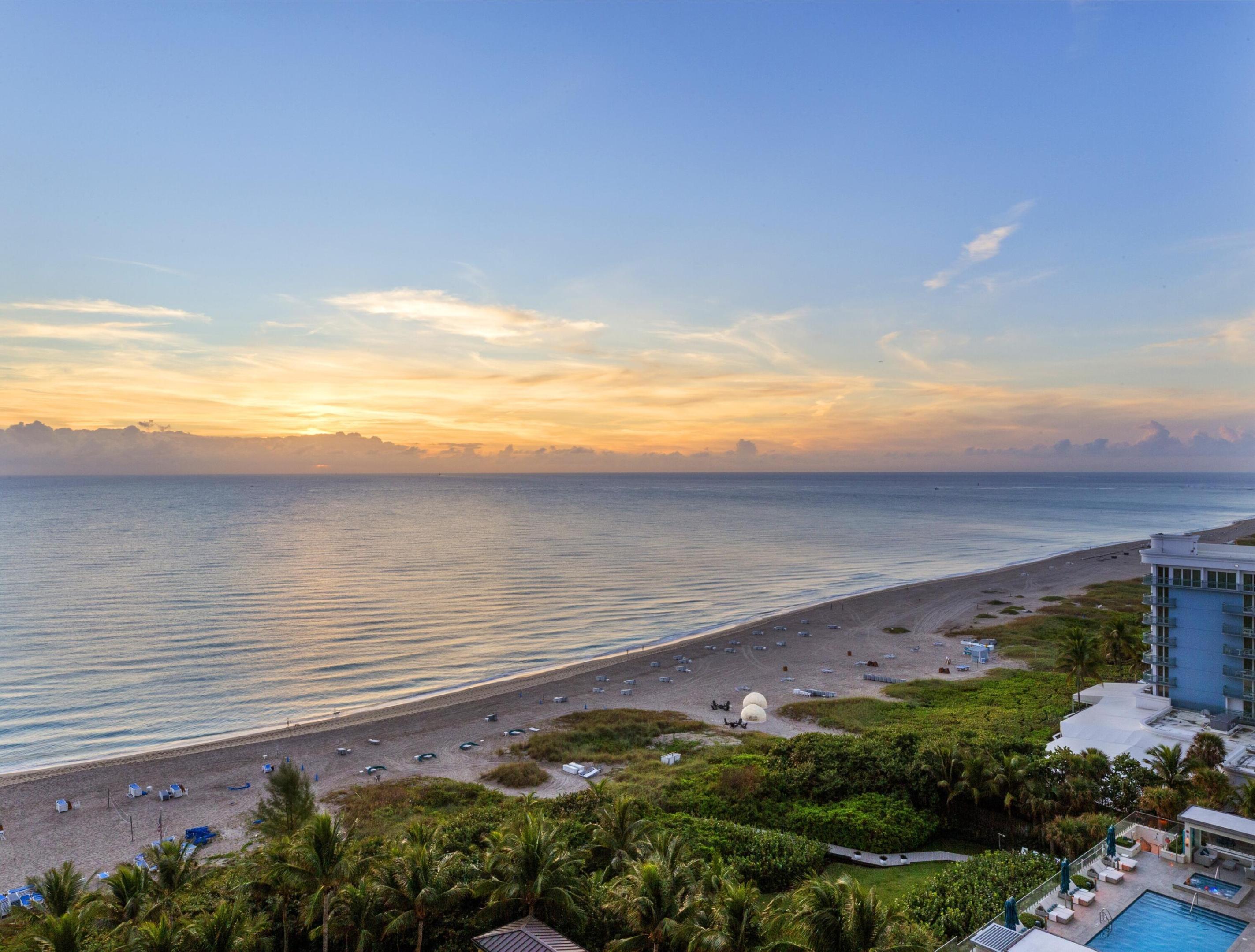 This stunning 3-bedroom, 3.5-bath residence delivers true luxury living. Set on the 14th floor, the spacious terrace showcases breathtaking views of both the Atlantic Ocean and the Intracoastal Waterway, while the coveted southeast exposure provides unforgettable sunrise & sunset views in season.  Enjoy the unparalleled lifestyle at the Resort at Singer Island, a four diamond property featuring full beach service, two pools, 3 on-site restaurants, bars, coffee bar & store, full-service spa, state-of-the-art fitness center, a theater, & kids' club—this is resort living at its finest.  A private elevator opens directly into your own foyer. Inside, you'll find a spacious home and a chef's kitchen with Viking stainless steel appliances, granite countertops, & designer finishes throughout The chef's kitchen is a masterpiece of form and function, featuring top-of-the-line Viking stainless steel appliances, including a gas range (that can be converted to electric), dual ovens, a wine refrigerator and contemporary style cabinets . Truly spectacular views of the ocean and Lake Worth Lagoon.  Welcome to the Resort at Singer Island-where 5-Star Luxury Meets Coastal Serenity  As an owner, enjoy exclusive access to all the luxury amenities of the adjacent Marriott 4-Diamond Resort & Spa, including oceanfront pools, cabanas, fitness center, full-service spa, on-site dining, concierge, and valet service.  Experience a world where modern refinement meets effortless oceanfront living. This is a must-see residence for the discerning buyer seeking the very best of Singer Island living.    Discover a world of refined elegance at The Resort at Singer Island, a rare oceanfront sanctuary offering the perfect fusion of private condominium living and four-diamond resort indulgence. Built in 2007 and operated in partnership with the Marriott & Urgo Hotels, this smoke-free luxury destination features 239 all-suite one- and two-bedroom residences and 66 private three- and four-bedroom condominiums, each designed for the most discerning owners and guests. The hotel has recently undergone an extensive renovation (both inside and outside).    Unparalleled Amenities   Two spectacular pools an expansive lagoon-style oasis and a tranquil lap pool with private cabanas set the tone for leisure and relaxation. Enjoy the 8,500-square-foot spa and fitness center, a private movie theater, billiard room, exclusive wine locker, signature restaurants and bar, concierge services, and valet parking. Every detail reflects the art of sophisticated coastal living.    The Private Residences   The private residential tower features just four spacious homes per floor, ranging from 2,800 to 3,150 square feet of elegant interior space and 350 to 450 square feet of outdoor terraces. A dedicated management team ensures seamless service and privacy, complemented by residents-only amenities including a screening room, social lounge, pool table and outdoor entertainment space with grilling stations.  The Resort Suites  For guests seeking refined resort living, the one- and two-bedroom hotel suites ranging from 800 to over 2,100 square feet offer a modern, polished design with stainless steel appliances, and marble baths. Residents and guests alike enjoy 4,000 square feet of meeting space, a world-class spa, and every comfort expected of a premier destination.  Personalized Service  Experience true resort living with butler service, valet attendants, and a full-time concierge who curate every detail from theater tickets and dinner reservations to private events and travel arrangements. Enjoy panoramic views of the Atlantic Ocean and Intracoastal Waterway from expansive terraces designed for relaxation and entertaining.  Dining & Leisure  Savor alfresco dining at the oceanfront restaurant, private catered events on the entertainment veranda, or the convenience of in-residence dining. A temperature-controlled wine room is available for private collections and each private residence has it's own wine locker. On the pristine sands of Singer Island, pool and beach attendants ensure effortless comfort with plush towels, chilled beverages, and shaded cabanas perfect for a leisurely lunch by the sea.    The Palm Beaches Lifestyle  Perfectly positioned between Palm Beach's iconic Worth Avenue, the championship golf of Palm Beach Gardens, Wellington's equestrian estates, and Riviera Beach's world-class sport fishing and snorkeling, The Resort at Singer Island places the best of South Florida within effortless reach. From designer shopping and fine dining to deep-sea excursions, polo matches and golf experiences, the Palm Beaches deliver a lifestyle without compromise just 15 minutes from Palm Beach International Airport.    The Singer Island Experience   Nestled along Florida's glittering Atlantic coastline, Singer Island is a 1,500-acre paradise of pristine beaches, lush natural preserves, and sweeping ocean vistas. Founded by Paris Singer, son of the famed sewing-machine magnate, this exclusive enclave is rich in history, elegance, and natural beauty. Home to Ocean Reef Park recently named the best beach on the Southeast coast of the U.S. the island offers world-class shoreline experiences. Whether you're sailing, paddle boarding, or simply watching the sun lift over the Atlantic, every moment on Singer Island captures the essence of sophisticated coastal living.