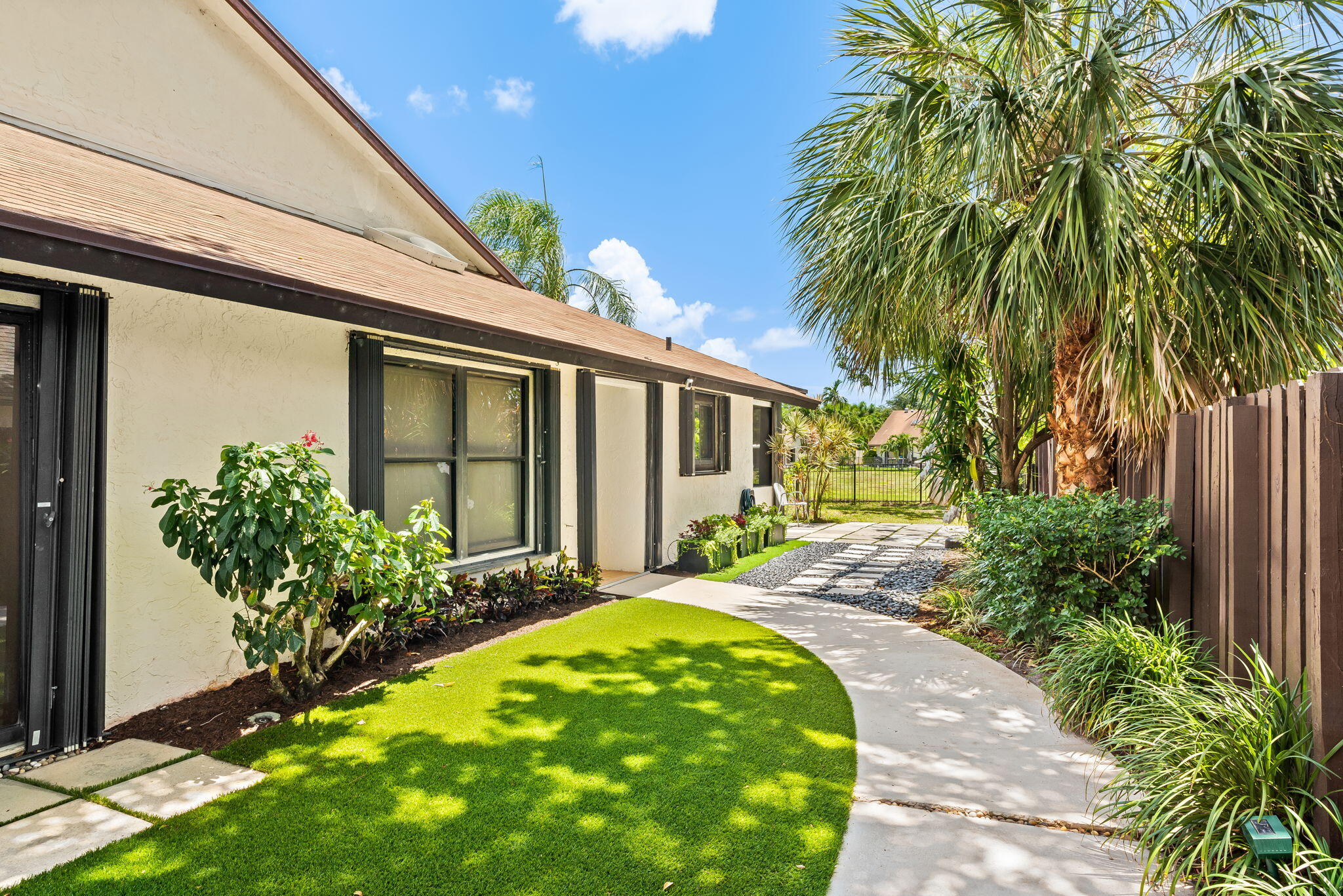 Completely renovated and beautifully furnished villa located at 305 SW 28th Avenue. This spacious home features 2 large bedrooms plus an oversized loft, offering flexible space for a home office, guest area, or additional living space. Enjoy an open and bright layout with modern finishes throughout. The screened-in patio overlooks a large fenced backyard with stunning lake views, perfect for relaxing or entertaining. Move-in ready and meticulously maintained, this property combines comfort, style, and waterfront living in one exceptional home. Lawn, Internet and Cable are inclusive within rental payment