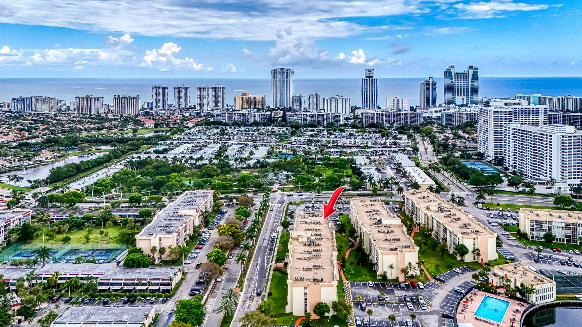 Welcome to DeSoto Park, your Dream Condo in the Heart of Three Islands! Don't miss this beautifully renovated 3-bedroom, 2-bath condo offering 1,210 sq ft of stylish, move-in ready living in one of Hallandale Beach's most sought-after gated communities. Whether you're a first-time buyer, a growing family, or a savvy investor, this property checks every box. The den has been converted into a 3rd BR, giving you the flexibility of a 3-bedroom layout at an incredible value. One of the true highlights of this unit is the two generously sized screened-in balconies, so wide, they feel like private terraces, accessible directly from each bedroom and the living room, perfect for morning coffee, evening relaxation, or entertaining guests outdoors. Porcelain Ceramic tile floors throughout the unit.  The association has recently completed a full building renovation including new paint, carpet, tile, laundry rooms, with elevator renovations currently being finished, ensuring the entire property feels brand new. Relax by the Olympic-size pool, challenge a neighbor to tennis, or take a stroll through the beautifully landscaped grounds. The building features a secure key-entry lobby, security cameras, and convenient laundry on every floor, everything you need without leaving home. Monthly HOA fee is $824.31. There is an assessment of $10,000, which the seller will pay out at closing. Situated in the vibrant Three Islands neighborhood, you're just a short walk to the beach, parks, shops, and restaurants. Minutes from Gulfstream Park, Mardi Gras Casino, Aventura Mall, Downtown Hollywood, and Fort Lauderdale International Airport. Places of worship, top dining, and entertainment are all close by. This community has no age restrictions and permits rentals right after purchase, making it a fantastic income-producing opportunity in a high-demand area. This one won't last. Schedule a showing today!