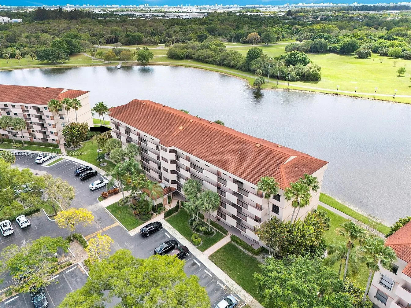 Bright and inviting 2BR/2BA corner unit in Applewood Village II featuring beautiful lake views and scenic views of Tradewinds Park. This well-maintained condo offers newer kitchen appliances, updated countertops throughout, and an abundance of natural light. The building includes both elevator and stair access for convenience. Residents enjoy all the outstanding amenities of The Township, including a clubhouse, fitness center, aquatic center, tennis, pickleball, basketball, walking paths, and more. A wonderful opportunity in a sought-after community!