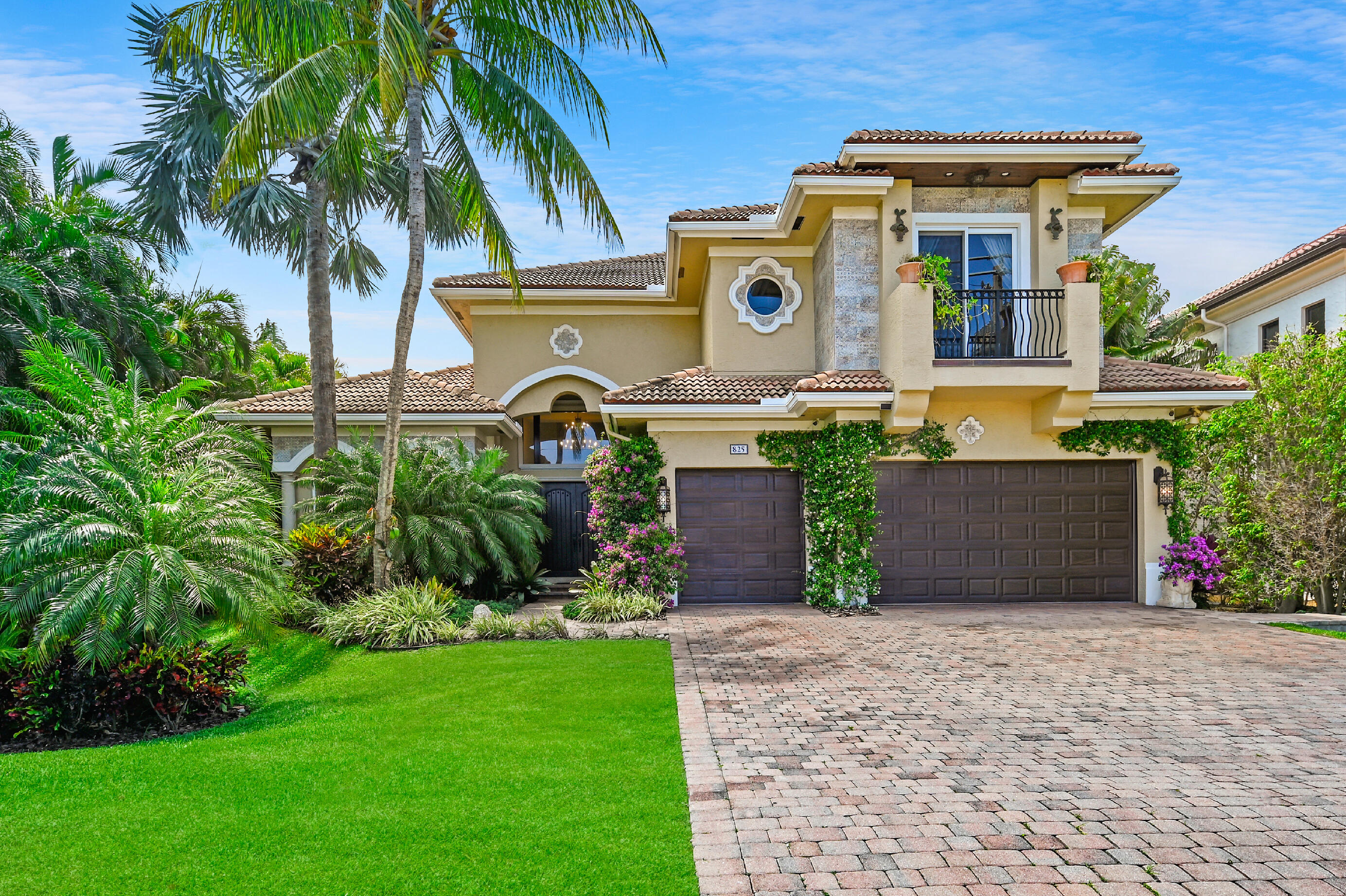 Boater's dream waterfront estate set on one of the widest points on the intercoastal minutes from inlet in the exclusive beach enclave of Hypoluxo Island within short walking distance to the ocean and The Palm Beach Eau Resort and Spa Hotel. This spacious 2 story, 4 bedroom & 4.5 bath family home stretches out at over 6,100 sq. ft. with over 4,600 sq. ft. of living space. Store your large yacht on the newer 26,000 lbs. boat lift complete with electric and water. Relax in your newly remodeled roomy outdoor kitchen with refrigerator will keep your drinks cool as you relax and sunbath on the patio. 24ft. ceilings and immediate expansive view of the intracoastal. First floor has a primary or guest bedroom suite. Open floor plan with large eat in kitchen and family room with fabulous water views throughout. Second floor include 3 additional bedrooms with ensuite bathrooms. Second-floor Primary bedroom suite has large his and her closets, walk-in shower, jacuzzi. Sip your morning coffee on the spacious 2nd floor patio overlooking the Intracoastal Waterfront.