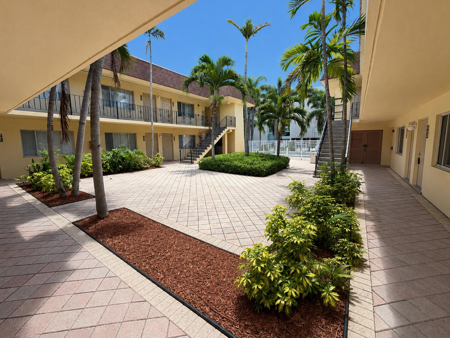 Charming 1-bedroom, 1-bathroom residence offering comfortable living in a well-maintained community. This inviting unit features a functional layout, abundant natural light, and a welcoming atmosphere.  Residents enjoy access to a community pool complete with new lounge furniture, creating the perfect setting to relax and soak up the sunshine. The complex also offers the convenience of an on-site laundry facility for added ease and practicality.  Ideally suited for those seeking low-maintenance living in a desirable community setting.