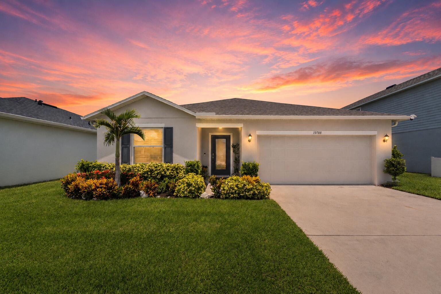 Welcome to this beautifully maintained single-story home in the desirable Crosstown Commons community. Offering 3 bedrooms PLUS OFFICE/DEN, 2 bathrooms, and 1,898 square feet of thoughtfully designed living space, this inviting residence features an open, functional floor plan ideal for both everyday living and entertaining. Enjoy added peace of mind with hurricane-impact windows throughout, complemented by elegant plantation shutters. Step outside to your own private backyard retreat featuring lush, beautifully maintained landscaping, a screened-in patio, and an extended paver area—perfect for relaxing or entertaining outdoors. A spacious 2-car garage provides plenty of room for vehicles and additional storage.  Best of all, the community offers a low HOA fee that includes cable and internet, adding even more value and convenience. Ideally situated in a convenient Port St. Lucie location, this move-in-ready home combines comfort, functionality, and Florida living at its best.