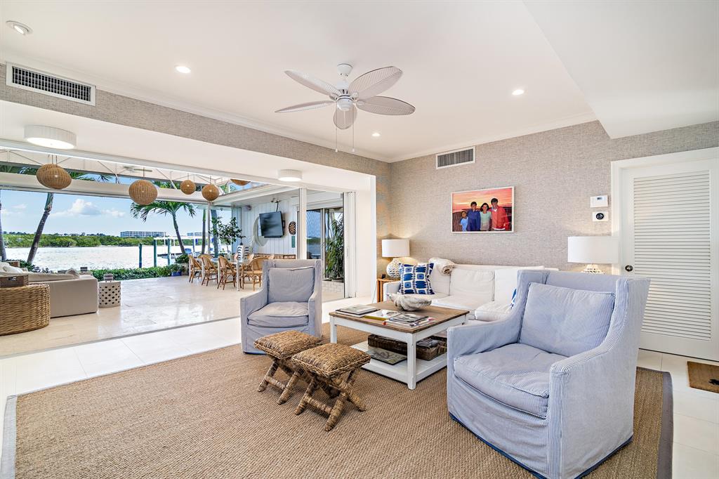 165 feet of direct waterfront point lot, huge covered loggia overlooking the sanctuary.  Water views galore, renovations include new decking, shutters, endless pool upgrades, outdoor lighting, upgraded systems and much more. House has a generator, being offered designer furnished. Brand new 2018 21ft Yamaha jet boat included!!!! Move in ready for the most discriminating buyer.