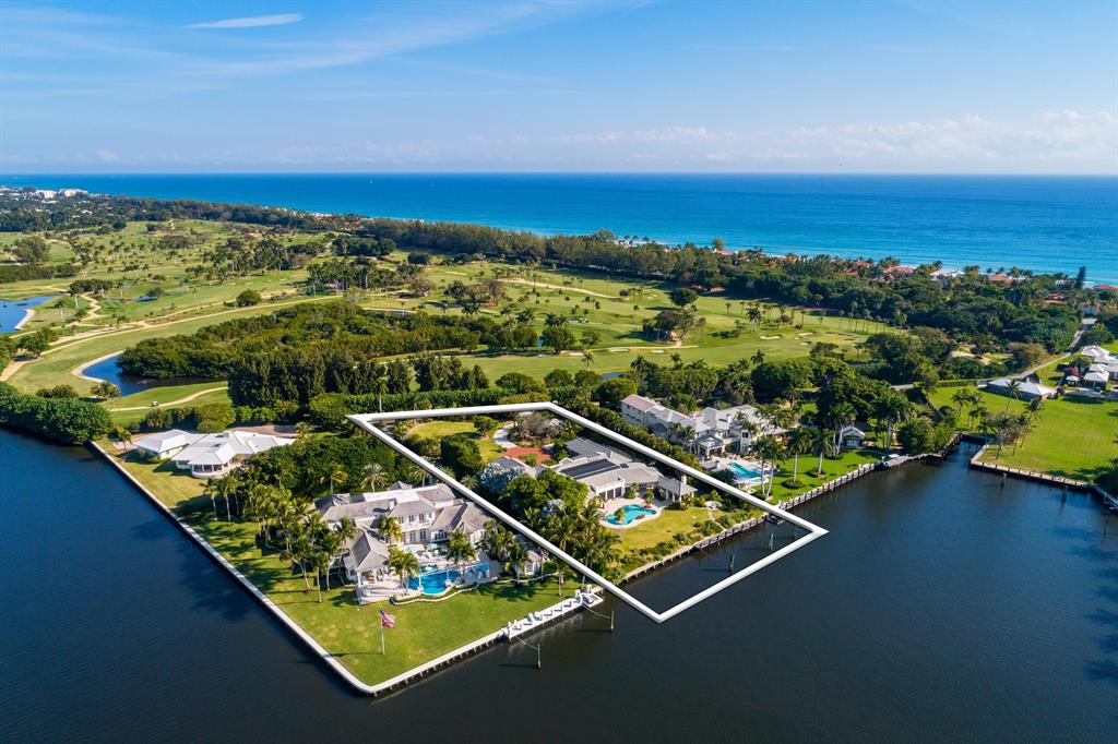 Sensational new Bermuda style home located in the estate section of Gulf Stream is sited on over 180' of water and offers deeded beach access. This residence represents a rare opportunity to acquire a custom home in one of the most desirable locations of Gulf Stream.  Judiciously designed by Bridges and Marsh, the home is graced by astonishing views from every angle and is as captivating as its setting featuring nearly 10,176 total sqft, 4BB and 5.1BA.  Filled with natural light, the interior features include superlative architectural details with finely crafted woodwork, a luxurious master suite, an epicurean kitchen for the culinary minded, solar energy and an oversized three car garage. Meandering gardens with native species offer a relaxing respite and distinguish this magnificent residence.  Affording today's sophisticated buyer the opportunity to enjoy the Florida lifestyle, this exquisite home is only moments to the world class beaches of Gulf Stream and Delray as well as fine dining and cultural events of famed Atlantic Avenue. Excluded items: Play set in Yard and Orchid House.