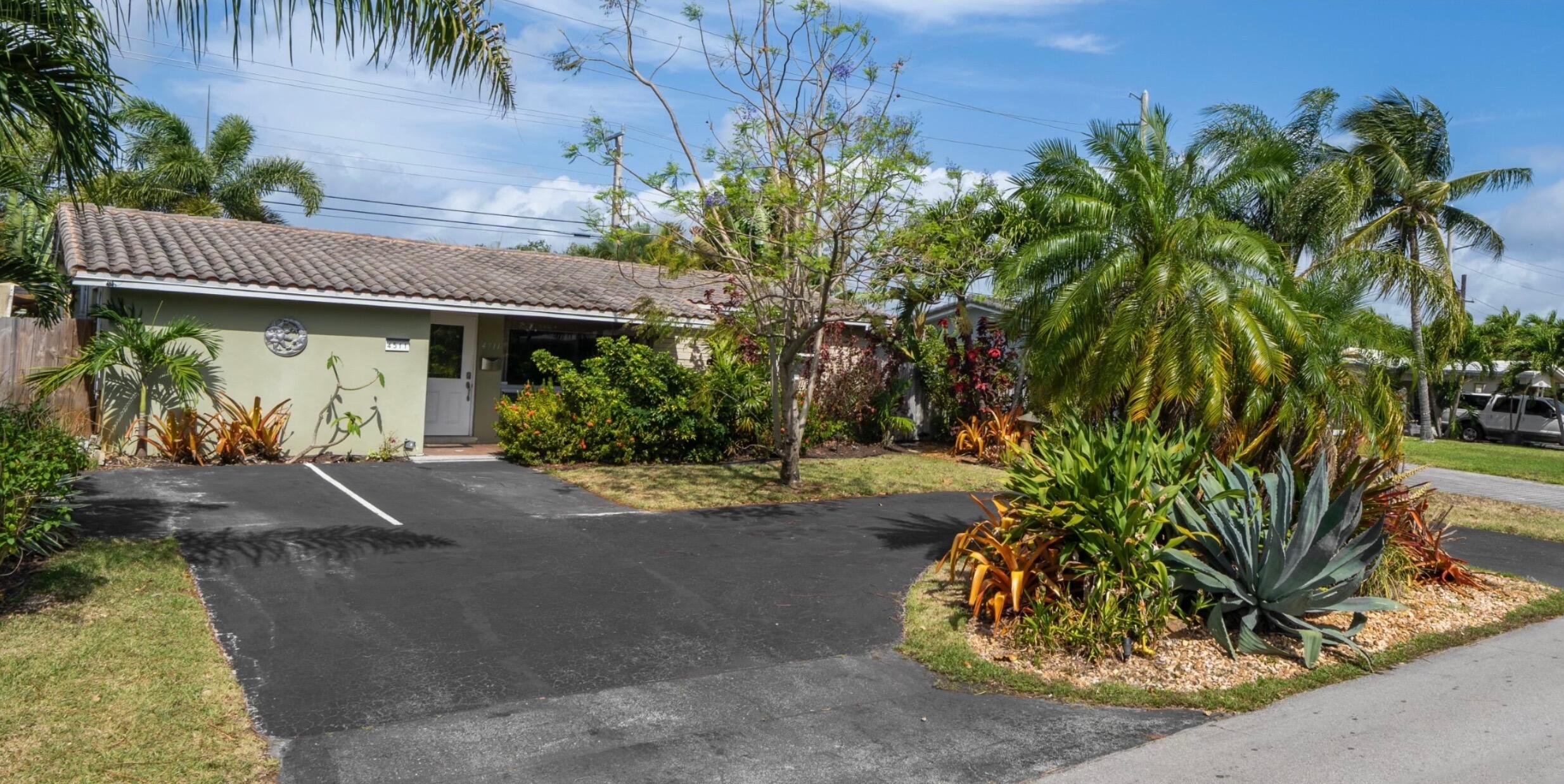 Enjoy resort style living with a heated private pool and fully fenced yard surrounded by beautiful landscaping! This versatile property features a 2 bed, 2 bath main home plus a separate 1 bed efficiency — ideal for guests, rental income, or multigenerational living. Furniture negotiable. Located in a friendly neighborhood near good schools.