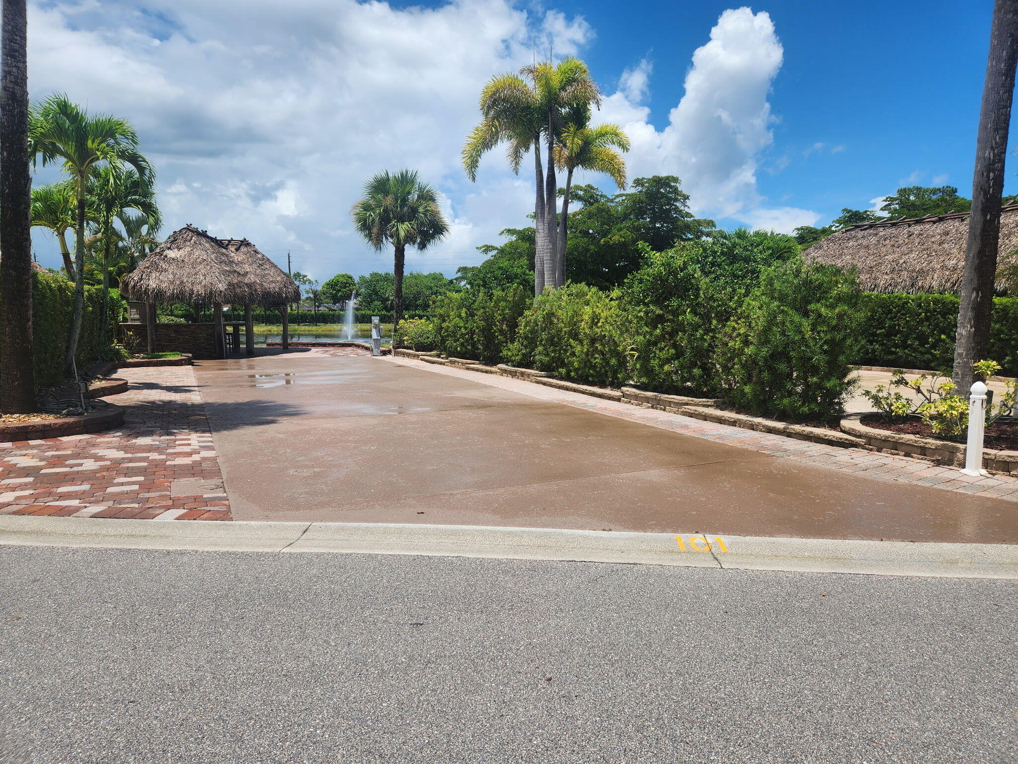 Well appointed back in lot with Tiki on the natural pond.  Soak in  the views of nature right off the rear view of your tiki!  Granite counters, stainless storage and drawers. Barstool seating for entertaining!  Painted cement pad with paver trim.  Mature landscaping adds to privacy!  18 hole golf on site and is included with your dues.  Amenities galore, such as pools, tennis, pickleball, dog parks, exercise, hot tubs and so much more round out this well price piece of paradise located t the Motorcoach Resort at St Lucie West - Class A units only.