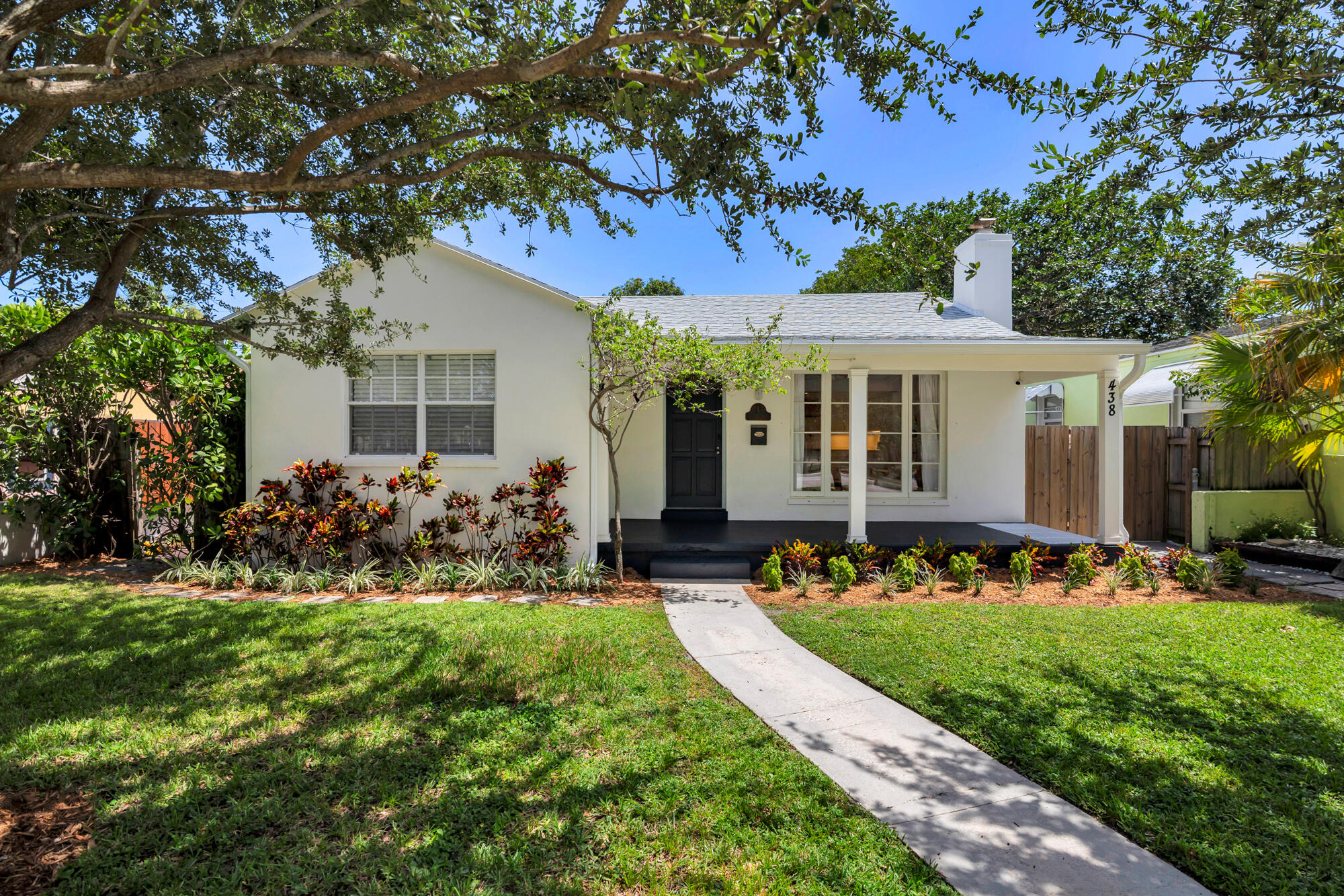Historic charm meets modern luxury in this beautifully updated 3 bed, 2 bath home in West Palm Beach's coveted Northwood neighborhood. The open concept layout features an original fireplace, luxury flooring, and a newly renovated gourmet kitchen. A bright separate office adds flexibility, while the primary suite opens through French doors to the saltwater pool. Two additional bedrooms and an updated second bath offer ideal privacy for guests. The fenced backyard is a private oasis with a covered entertaining area perfect for Florida living. Steps from the Intracoastal, La Marina restaurant, and Safe Harbor Marina, and just minutes to Northwood Village, Currie Park, Palm Beach Island, Downtown WPB, and PBI Airport. New roof (Nov. 2023).