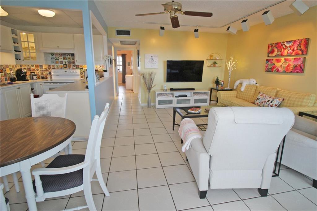 4TH FLOOR LAKE VIEW!! YOU WILL LOVE TO SIT AND ENJOY YOUR COFFEE ON THE ENCLOSED PATIO OF THIS 2 BEDROOM, 1.5 BATH! NOT ONLY DO YOU HAVE A GORGEOUS VIEW, BUT WAIT UNTIL YOU SEE THE UPDATED KITCHEN WITH NEW CABINETS, COLORFUL TILE BACKSPLASH AND EXTRA CABINETS IN THE DINING ROOM!! SO MUCH STORAGE SPACE!! CERAMIC TILE FOORS THRU-OUT! FULLY FURNISHED WITH KING SIZE BED IN THE PRIMARY BEDROOM AND SOFA BED IN THE GUEST ROOM! PRIMARY BATHROOM FEATURES A NEW VANITY & TOILET, PLUS GLASS SHOWER DOORS! GUEST BATH HAS NEW VANITY & TOILET, TOO! HURRICANE SHUTTERS ON FRONT WINDOWS FOR EXTRA SECURITY! CENTURY VILLAGE EAST IS A GATED COMMUNITY WITH FREE TRANSPORTATION INSIDE AND OUT! THEIR FABULOUS CLUBHOUSE FEATURES CLASSES, CLUBS, FREE MOVIES, BROADWAY SHOWS & STATE OF THE ART GYM!! ASSOC. CLAIMS 55+