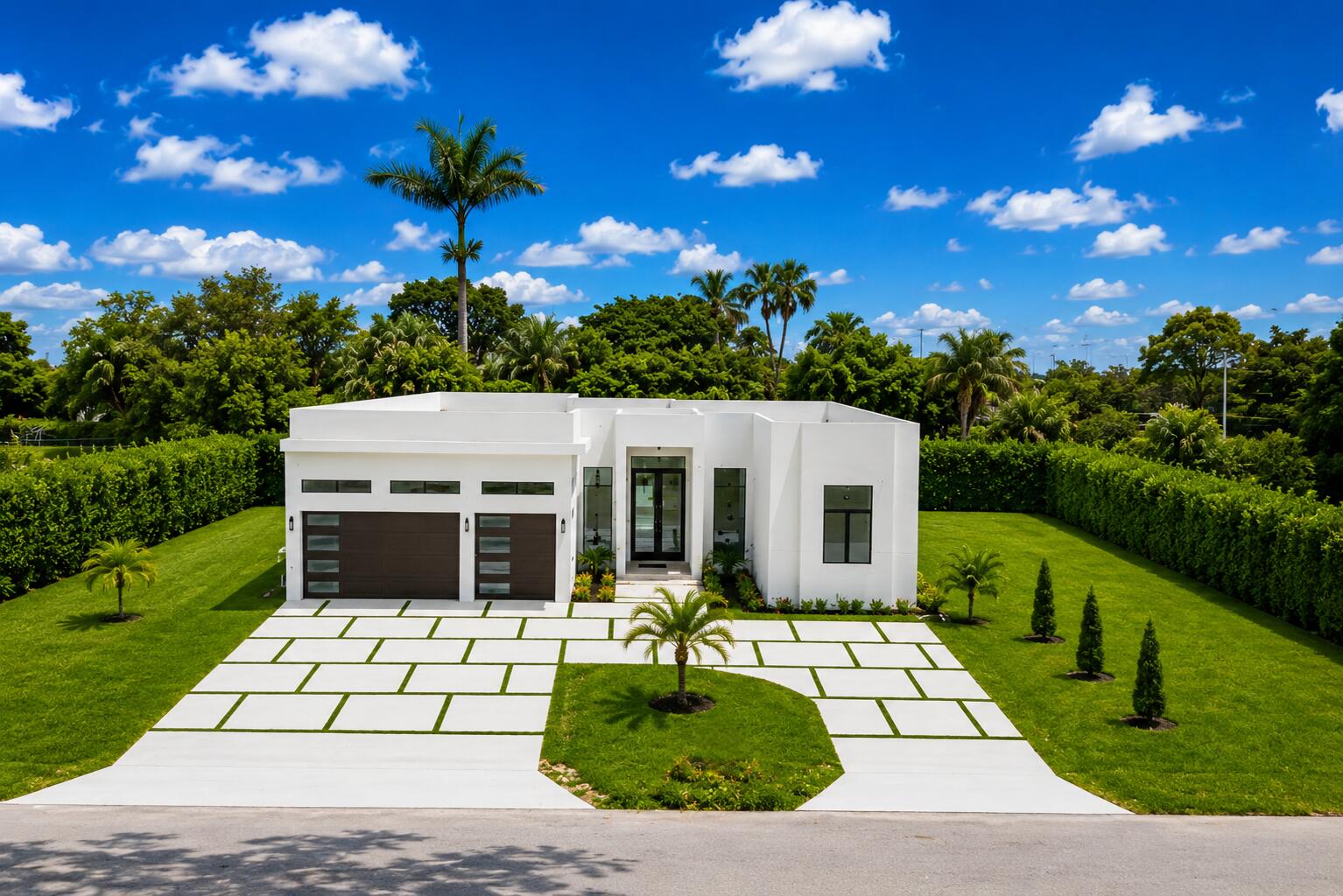 Welcome to this unique and luxurious modern Estate in Plantation Acres. This 2024-built home, blends sophisticated contemporary design with smart-home convenience. 3,000 sqft of living area and soaring 12' ceilings, 4 beds + a large media room, 3 baths, and a 3-car garage. An elevated experience throughout. Enjoy a true retreat from your master Bedroom, with a spa-inspired bath, dedicated  his-and-hers vanity areas, and separate shower and toilet enclosed rooms. With floor to ceiling windows throughout, this home is filled with natural light and contemporary elegance, chef's kitchen and a striking glass wine display. The expansive lot provides room to create the ultimate backyard oasis and your dream pool. Rare opportunity to own a modern estate without the wait of New construction! Please ask the listing agent any questions you may have.