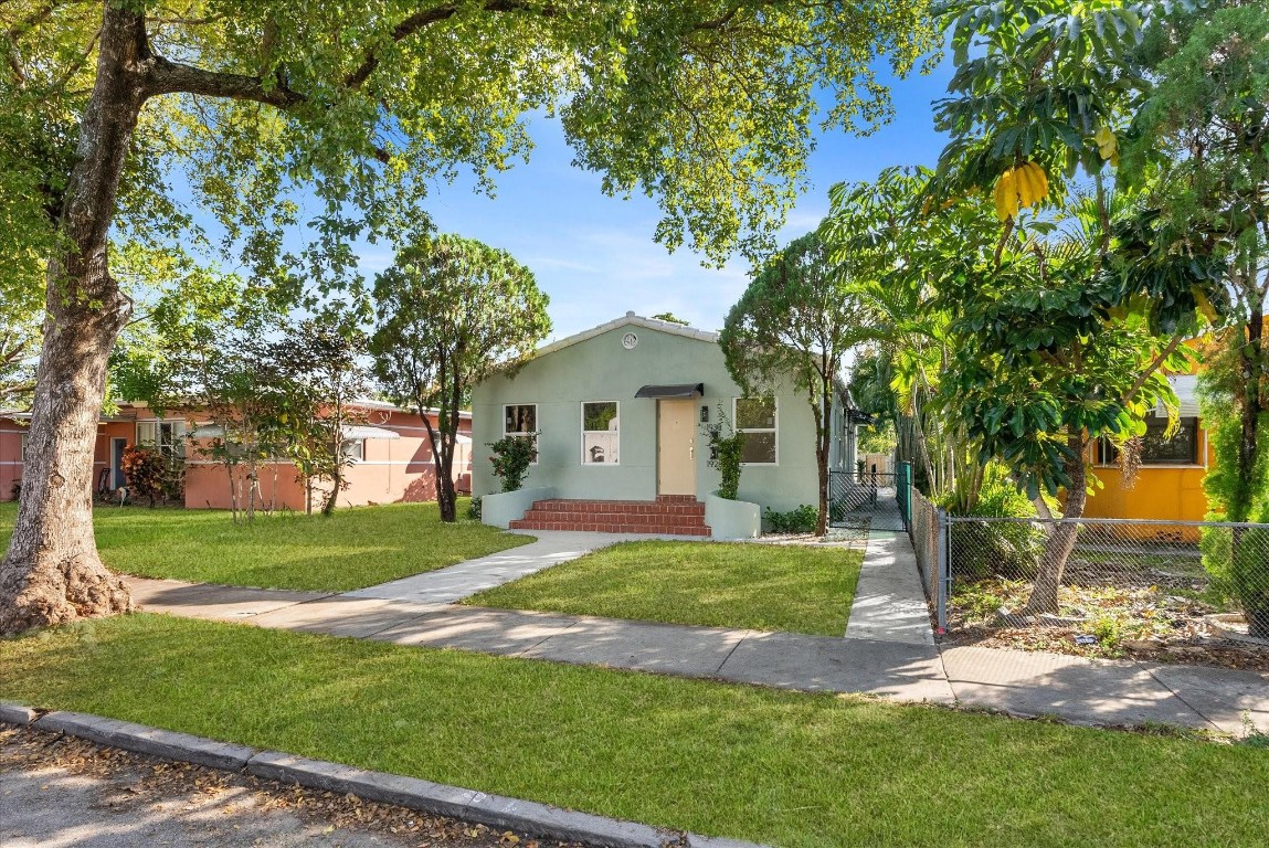 Price increase to make room for new roof. Motivated Seller!!  2-2 bedroom/1 bath units 6/10ths of a mile to Downtown Hollywood and Young Circle Park, approximately 1 mile to the beach. Whether you are looking for a primary residence, investment opportunity, this is the place for you. Impact windows and doors throughout, newer appliances, one year-old AC, newer gas water heaters in both units. Washer and dryer connections are in the yard. Four parking spots in the back alley.(property line goes to the street)Front unit has laminate floors throughout, back unit has tile floors throughout. Excellent Airbnb, short term rental or primary resident options.