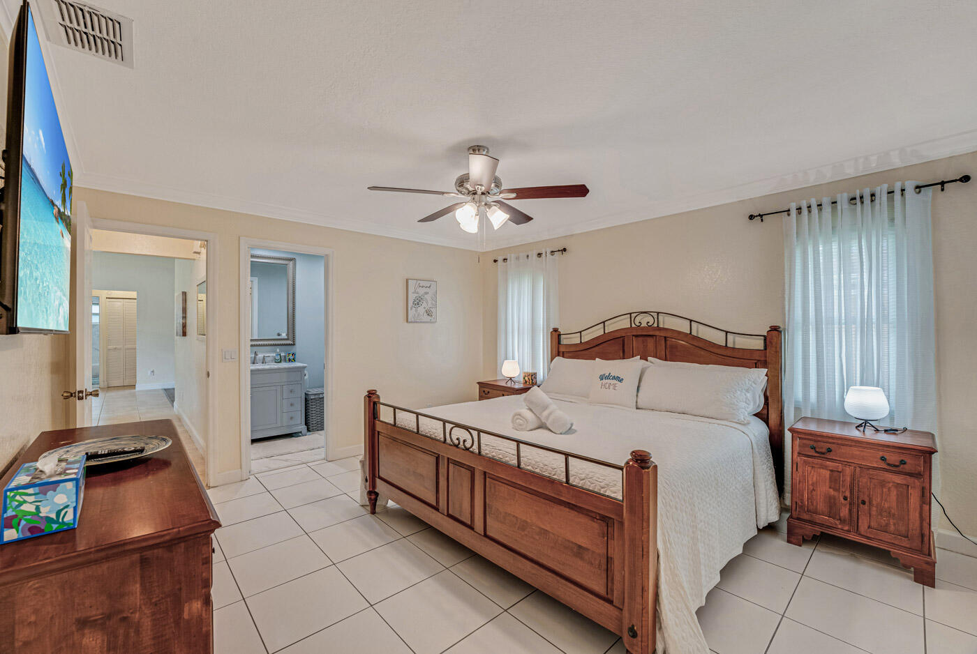 This home is ready for you! has been updated with a new roof in 2022 and a new A/C, dishwasher and water heater in 2024. Both bathrooms were remodeled in 2023. Hurricane impact windows and doors through out. No insurance worries here! Kitchen features granite counters and stainless steel appliances. Large family room along the back of the home. Tile and laminate flooring throughout. The huge nearly quarter acre lot is fully fenced in the back with mature fruit trees and room for a pool. Large patio provides plenty of space to entertain outdoors. There is also a separate 10x10 utility building with electricity, offering additional storage or work space. This home has everything including a great price! Furniture is negotiable.