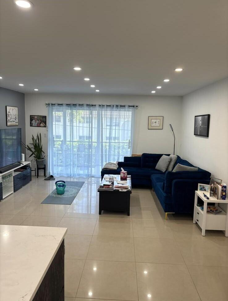 First impressions matter and this one is unforgettable. The moment you walk through the door, your eyes are drawn to the stunning open concept living space where a sleek European inspired kitchen becomes the heart of the home. High gloss cabinetry, stainless steel appliances, a smart refrigerator, oversized porcelain tile floors, and recessed lighting create a fresh sophisticated look that is both elegant and inviting. This impeccably redesigned from top to bottom 2 bedroom, 2 bath corner home offers quality upgrades such as a custom closet system, 2024 carrier central A/C, and hurricane impact windows. Set on the 2nd floor of an elevator building in a desirable 55+ community in downtown East Boca Raton, minutes from the beach. Assessments are paid, Assoc. has fully funded SIRS.  This is an active adult 55+ years of age community per Association. Buy with confidence many value worthy updates have been made to the building: Main Electrical panel updated Autumn 2025 and New roof installed Nov. 2025 SIRS and City mandated Studies completed. SIRS reserves are fully funded per Association. **Rental restrictions** Must own property for 2 years before lease. Lease only 1 time per 12 month period. 6 month maximum lease term.