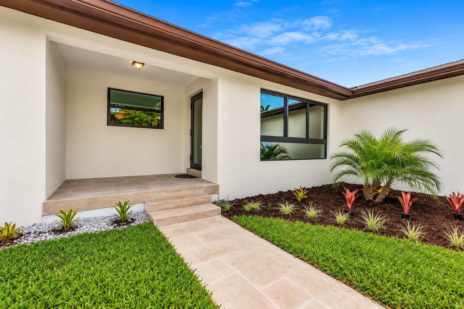 Beautifully updated 2-bedroom, 2-bath home with a 1-car garage, impact windows and doors, and an inviting open-concept layout designed for modern living. Enjoy tranquil water and lush tropical views from your screened pool and patio, creating the perfect setting for relaxing or entertaining. Ideally located on a quiet street just minutes from the Orangebrook Golf & Country Club, Hollywood Beach, downtown Hollywood, shopping, dining, parks, and major highways. Move-in ready with style, comfort, and an unbeatable location.  *photos are virtually staged