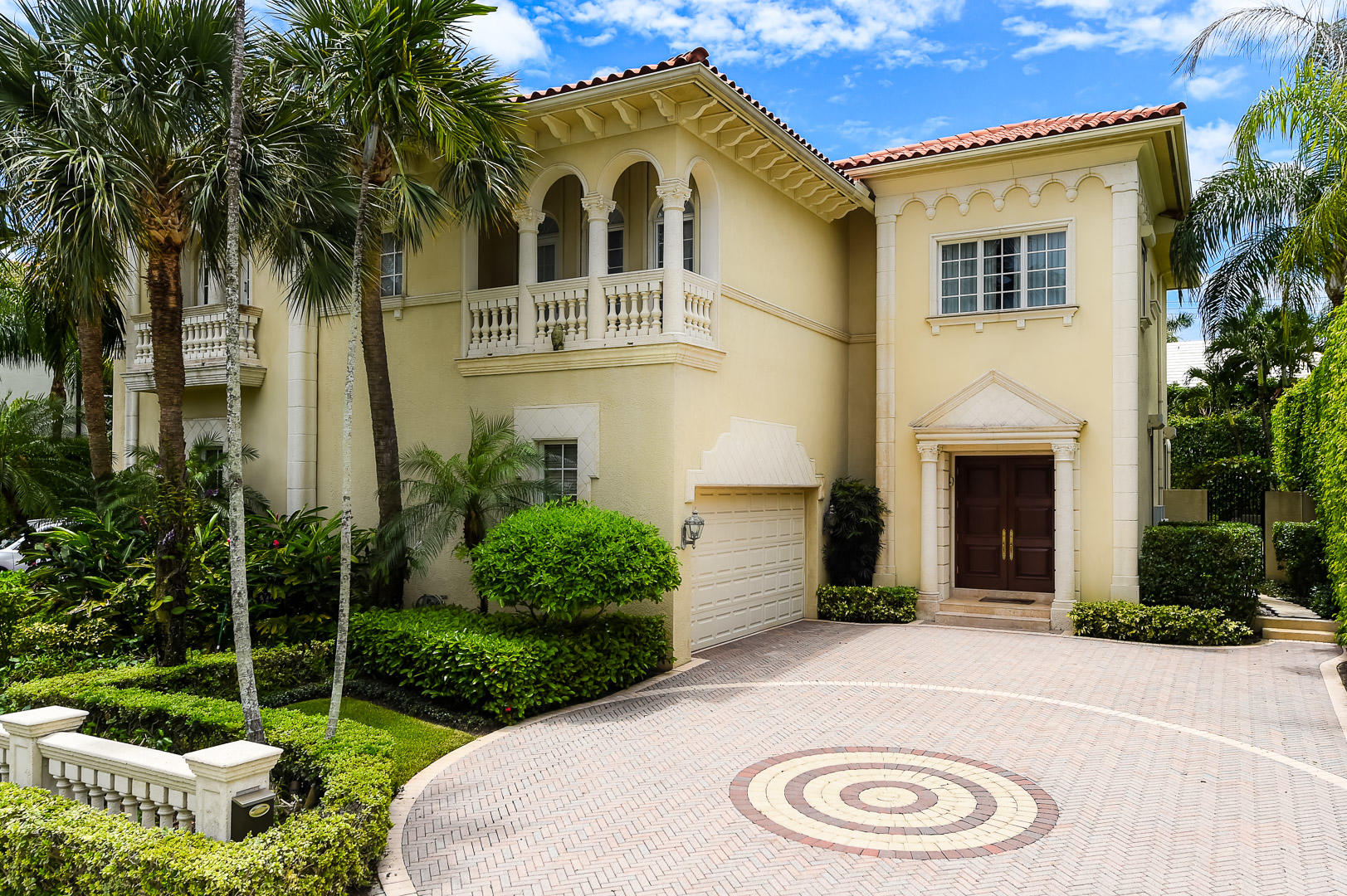 Palm Beach escape. This meticulously maintained 4 bedroom residence features high ceilings and and stunning finishes on two spacious floors. Additionally the property provides a large eat in kitchen, formal dining room, gracious living rooms with 14 foot cove ceilings, crown moldings, marble floors, a luxurious master suite with two baths, custom wood home office, private elevator, open gourmet kitchen, private heated pool with tropical landscaping, 2 car a/c, garage. Location allows the owner to walk to many restaurants, shops, markets, church/synagogues, as well as convenient access to the beach and lake trail.