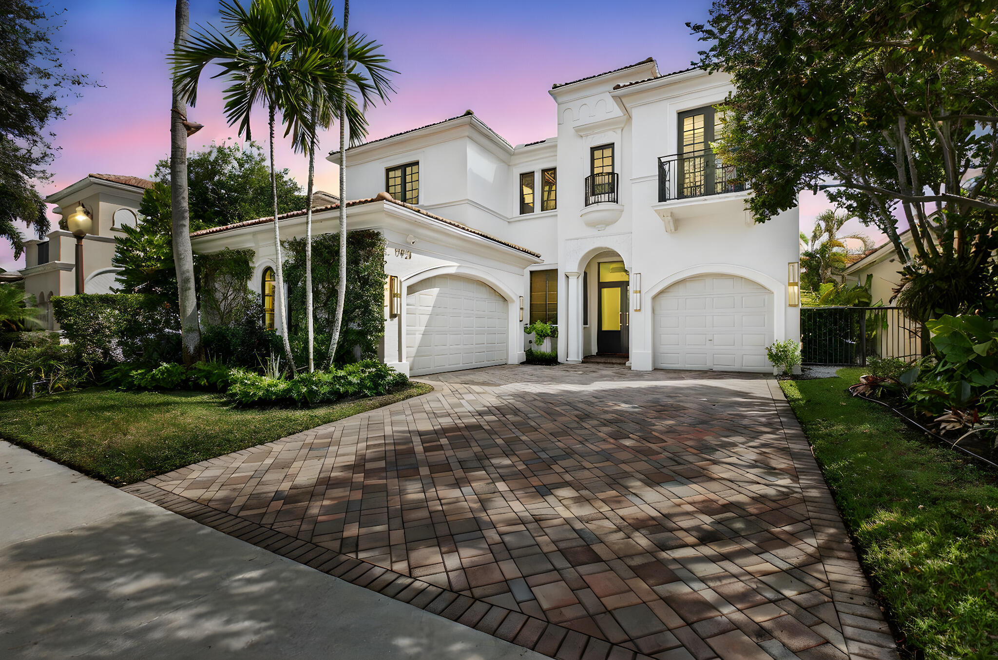 ELEVATED MEDITERRANEAN-nestled in prestigious 'The Oaks' of Boca Raton extensively renovated 5-bedroom, 6-bath lakefront home , offering nearly 4,500 sq. ft. of elegant, open-concept space with serene water and greenery views. High-end finishes and upgrades shine throughout, including a first-floor primary bedroom suite with beautiful water views and an executive office/library. The chef's kitchen features Wolf and Sub Zero appliances, dual islands, custom cabinetry, with a wine cooler and an adjacent wet bar-ideal for everyday living and entertaining. Upstairs bedrooms include en-suite baths for comfort and privacy. Enjoy resort-style amenities;Cosmetic Spa, fitness center, tennis, pickle ball and restaurant in an esteemed gated community.