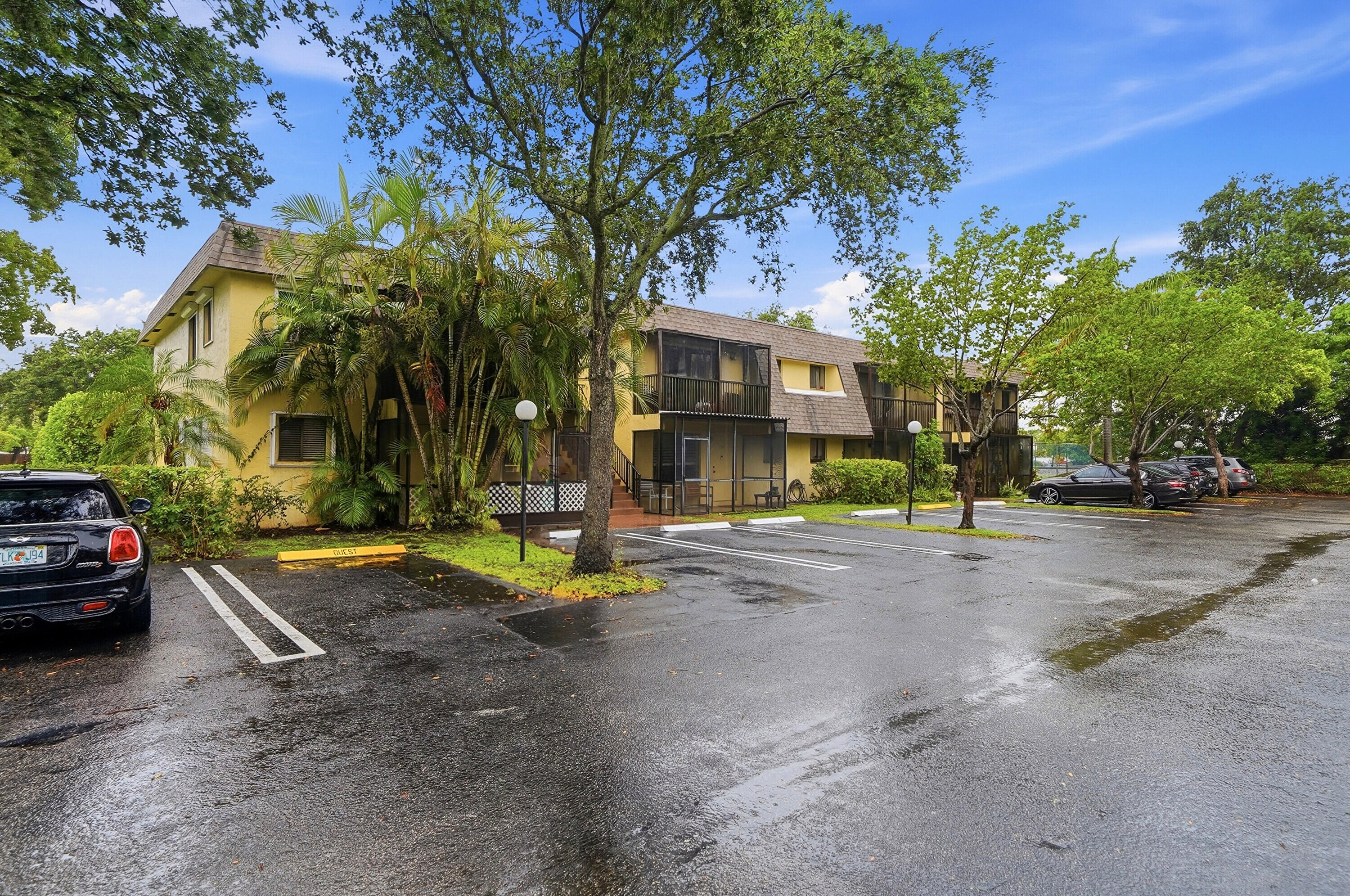 You will love this spacious and well maintained first floor unit with two bedrooms and two full bathrooms. This home features a separate kitchen and dining area with a large living room space and plenty of closets throughout. Wood laminate flooring runs through the home for a clean, modern look and easy maintenance. Enjoy the convenience of an in-unit washer and dryer along with a screened porch entry way, perfect for enjoying a coffee outside in the morning or evening relaxing. Residents have access to community amenities such as a large swimming pool, gathering area and tennis court. This home offers an ideal combination of comfort, convenience and value!