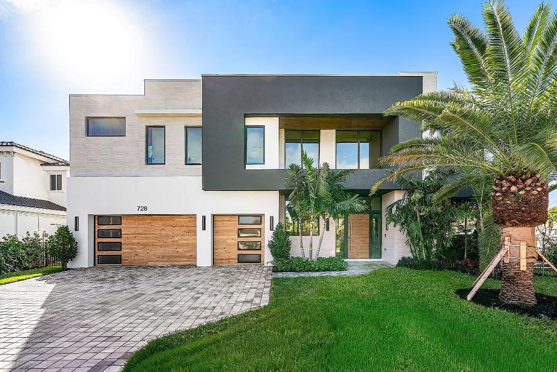 Prepare to be captivated by this extraordinary corner estate in coveted Boca Harbour, offering nearly 180 feet of deep-water dockage just moments from the Intracoastal. Designed and exquisitely furnished by Clive Daniel, this brand-new residence by Mizner Development is perfectly positioned on a protected corner lot, featuring dual docks and sweeping panoramic water views.
Inside, the home unfolds into five beautifully appointed ensuite bedrooms, a first-floor club room designed for effortless entertaining, and an upstairs loft ideal for relaxed living or play. The chef's kitchen is a true showpiece, showcasing Hans Krug cabinetry paired with Wolf and Sub-Zero appliances—where form and function meet refined elegance.
The expansive upstairs primary suite serves as a private retreat, complete with panoramic windows and balcony access, generous fully built-out closets, and a sun-drenched spa-like bath featuring dual water closets. Three additional upstairs ensuite bedrooms offer custom closets and impeccable finishes. The loft opens seamlessly onto an oversized balcony, creating the perfect setting for sunset lounging or an evening nightcap overlooking the water.

Outdoors, the estate truly shines. A resort-style pool and spa anchor the expansive entertaining area, while the wraparound dock boasting nearly 180 feet of water frontage accommodates multiple yachts, jet skis, paddleboards, and every waterfront indulgence imaginable.
Just completed and offered fully furnished, this exceptional residence presents a rare opportunity for a nearly turnkey waterfront lifestyle in one of Boca Raton's most desirable boating communities.