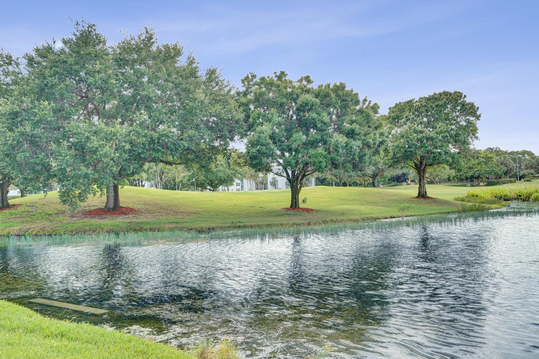 SUPER 1BR/1BA CONDO LOCATED IN A PRIVATE, COUNTRY CLUB COMMUNITY.ALL AGES WELCOME*1 PET <20LBS OK, UNIT FEATURES UPDATED KITCHEN,GRANITE TOPS,WHITE SHACKER CABINETS. ENCLOSED, 1ST FLOOR PATIO OFFERS BEAUTIFUL GOLF AND WATER VIEWS. . NEW A/C (2026).  ENJOY RESORT-STYLE AMENITIES INCLUDING EXECUTIVE GOLF COURSE, TENNIS, PICKLEBALL, BOCCE BALL, SAUNA, STEAM ROOM, GYM, HEATED POOL WITH POOLSIDE SPORTS BAR, AND FINE DINING RESTAURANT. CLOSE TO I-595, SHOPPING, DINING, DAVIE COLLEGES /UNIVERSITIES. MOVE-IN READY * GOOD CREDIT PLEASE