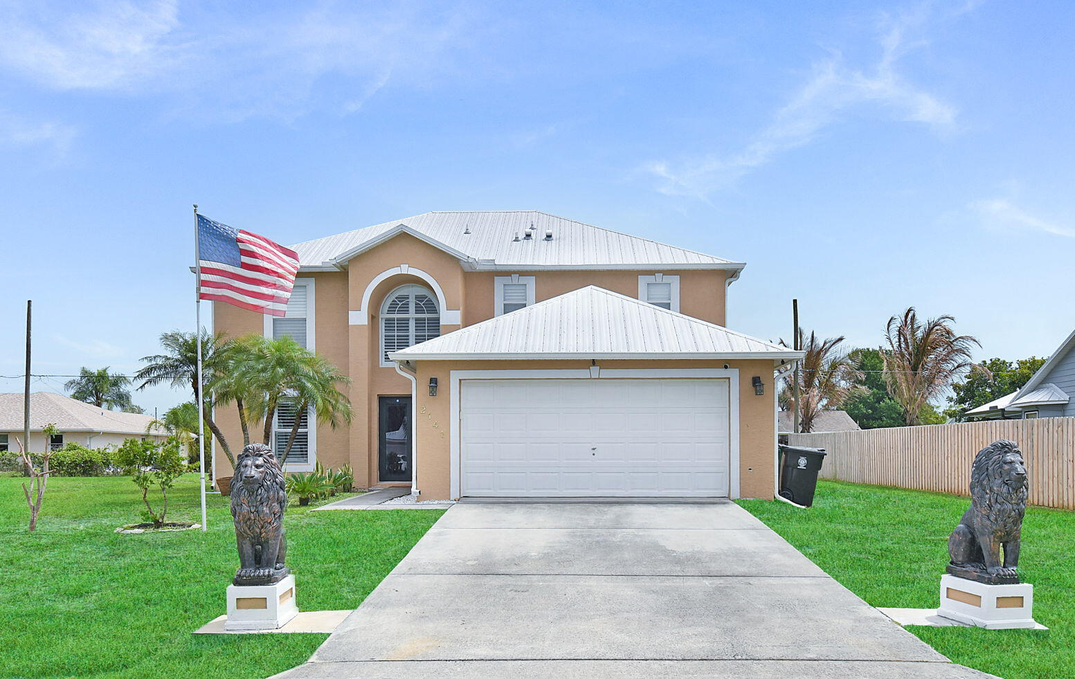 Welcome to this  2002 year built home  offering 4 bedrooms and 2.5 baths, designed with both comfort and functionality in mind.  A durable metal roof installed in 2020 adds long-term value and peace of mind.  The spacious 1st floor features  a large family room perfect for entertaining, along with a versatile media room that can easily serve as a home theater, playroom or office. Upstairs, you will find all 4 generously sized bedrooms, each complete with its own walk-in-closets, providing ample storage for everyone. Step outside to enjoy a sizeable backyard, ideal for gatherings or relaxation, along with an enclosed porch/patio area that extends your living space year -round. This home offers the perfect blend of space, flexibility and it is ready for you to make it your own.