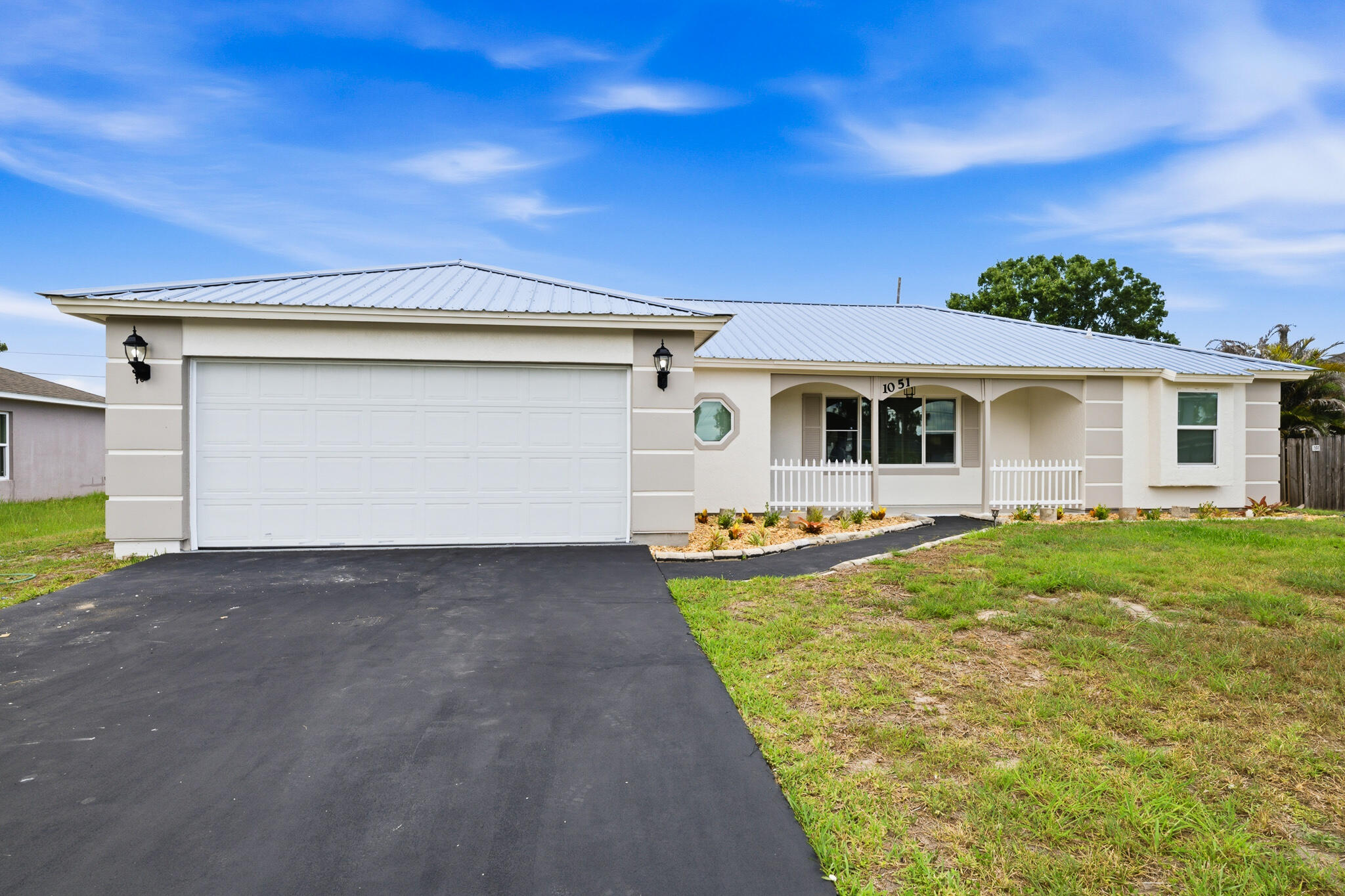 Welcome to this charming 3-bedroom, 2-bathroom residence in Port St. Lucie, offering 1,714 square feet of comfortable single-story living. The thoughtfully crafted floor plan maximizes comfort and functionality, perfect for everyday life.  • Convenience at Your Fingertips: Enjoy easy access to a dual-car garage, making parking and storage a breeze.  • Stylish Upgrades: Experience luxury details throughout that elevate your living experience and reflect a lifestyle of sophistication. Nestled in an established community, this home combines practical comfort with undeniable charm. Don't miss your chance to make it yours!