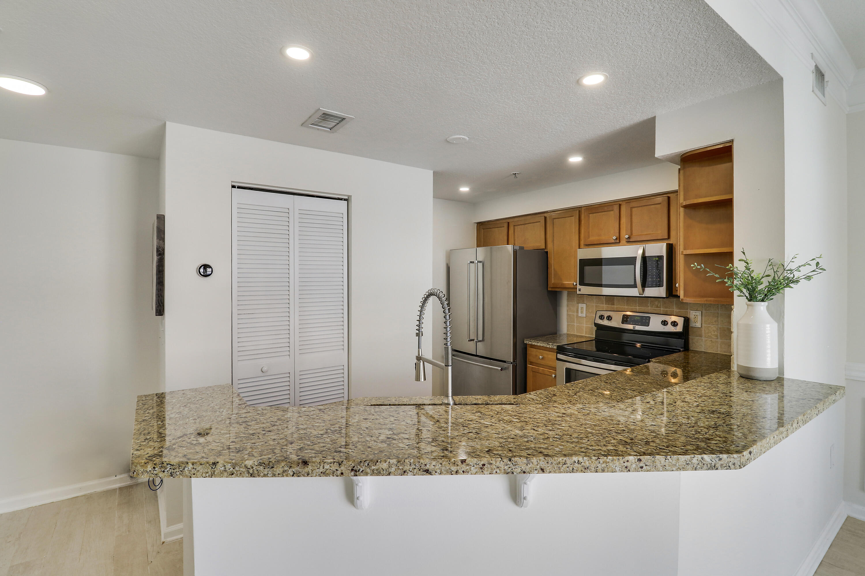 SOMERSET AT ABACOA CONDO - Residential