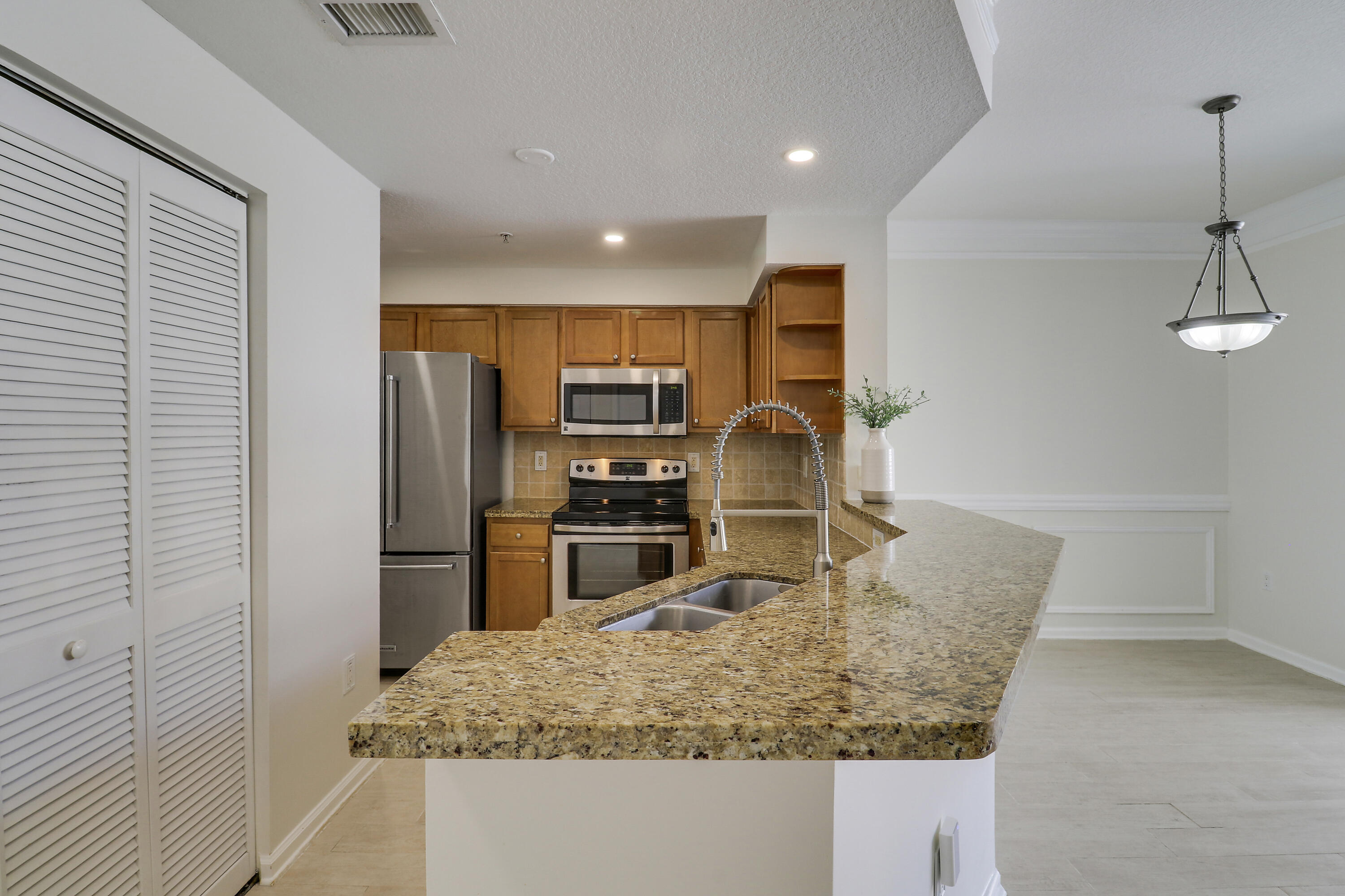 SOMERSET AT ABACOA CONDO - Residential
