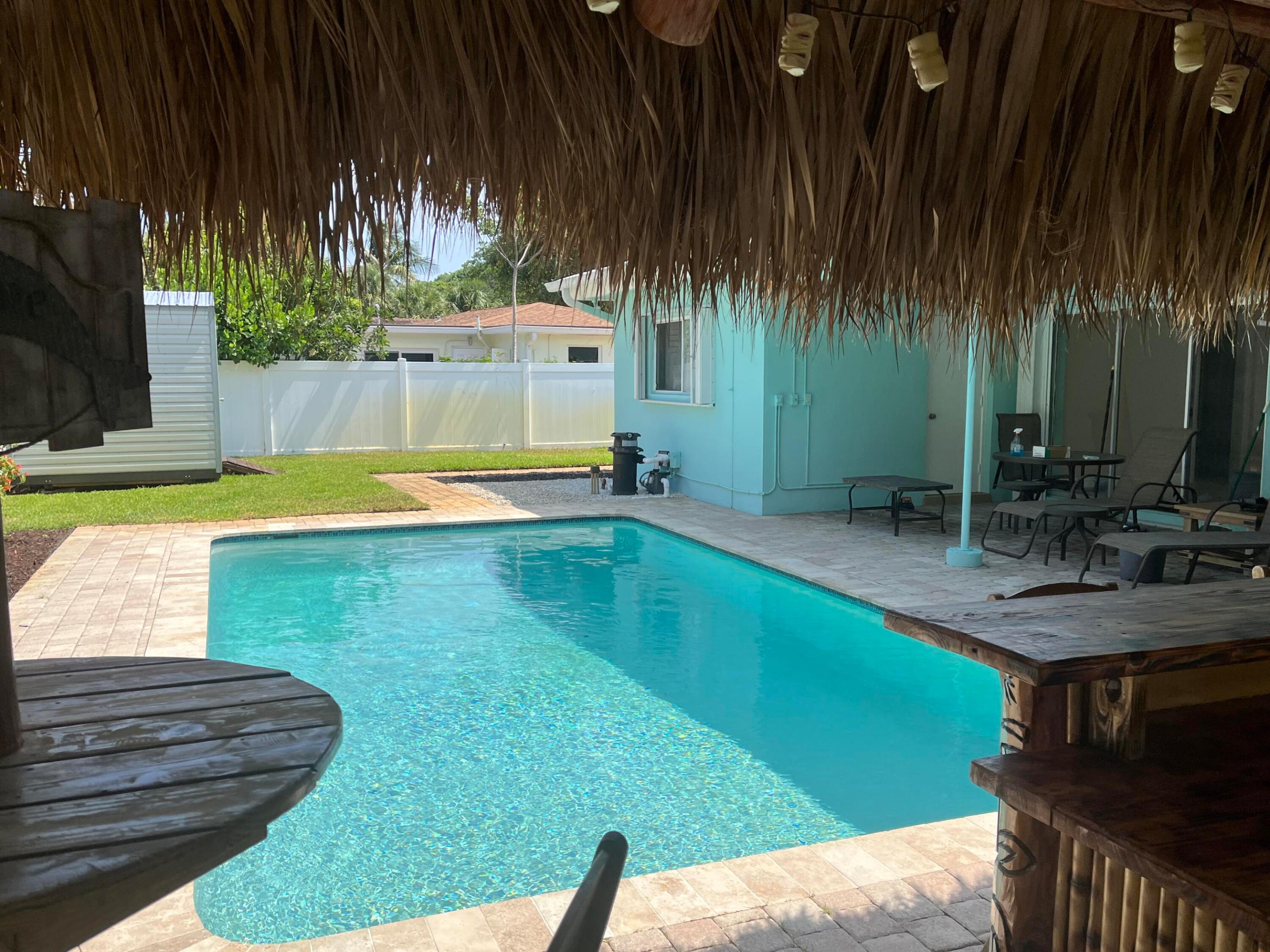 Totally refreshed home, List of updated features will be attached ,Includes new plumbing Pvc replacement of the cast Iron Pipes under the home ,Tiki Hut has been updated with a new roof. Charming and quiet Winfield Park, Wonderful East Boca Location, Minutes to Spanish River Park and the downtown Boca Area,