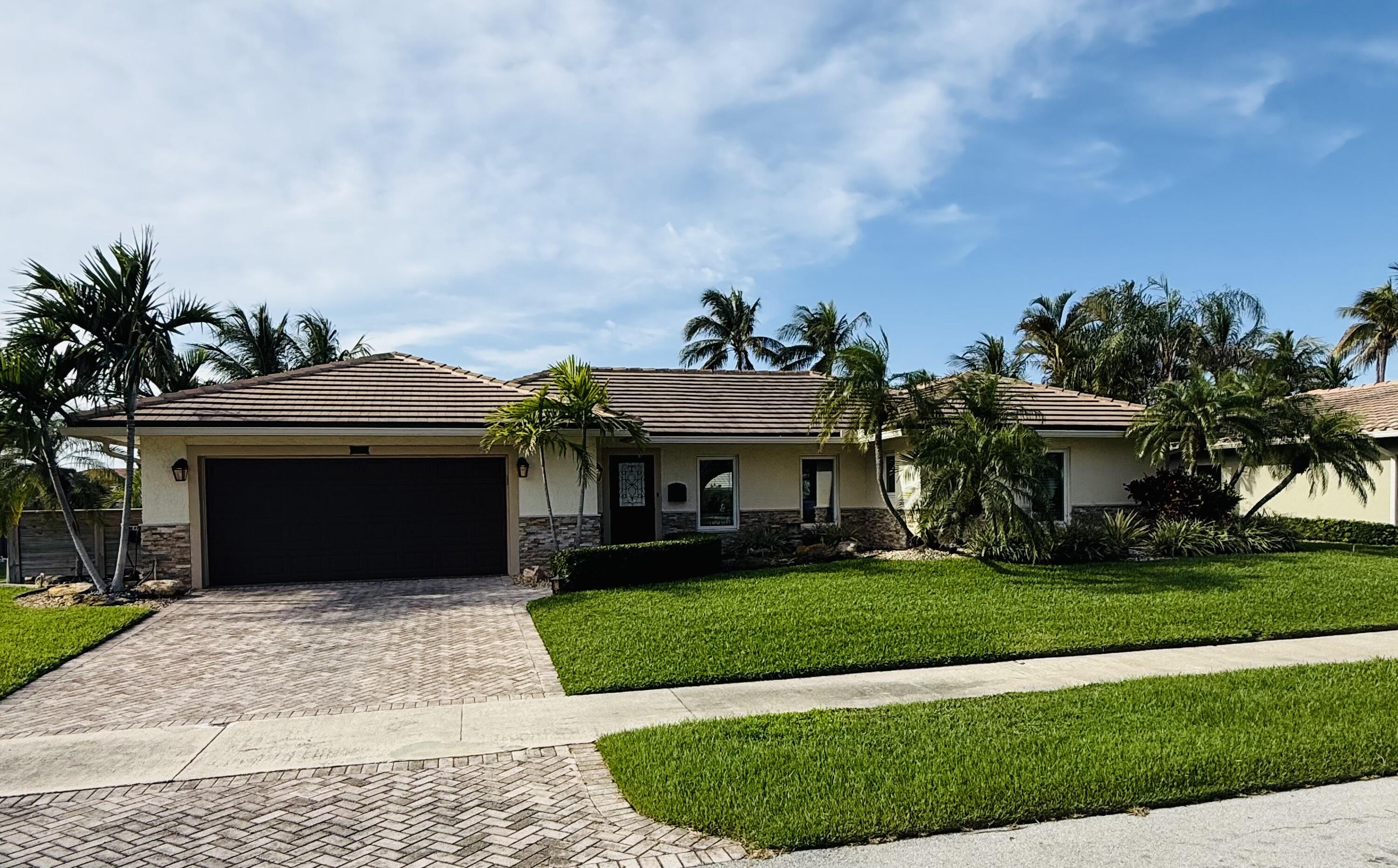 Rarely available deep water oversized lot. Newly updated home with direct ocean access and view of intracoastal waterway in the Cove area of Deerfield Beach. Come see for yourself!