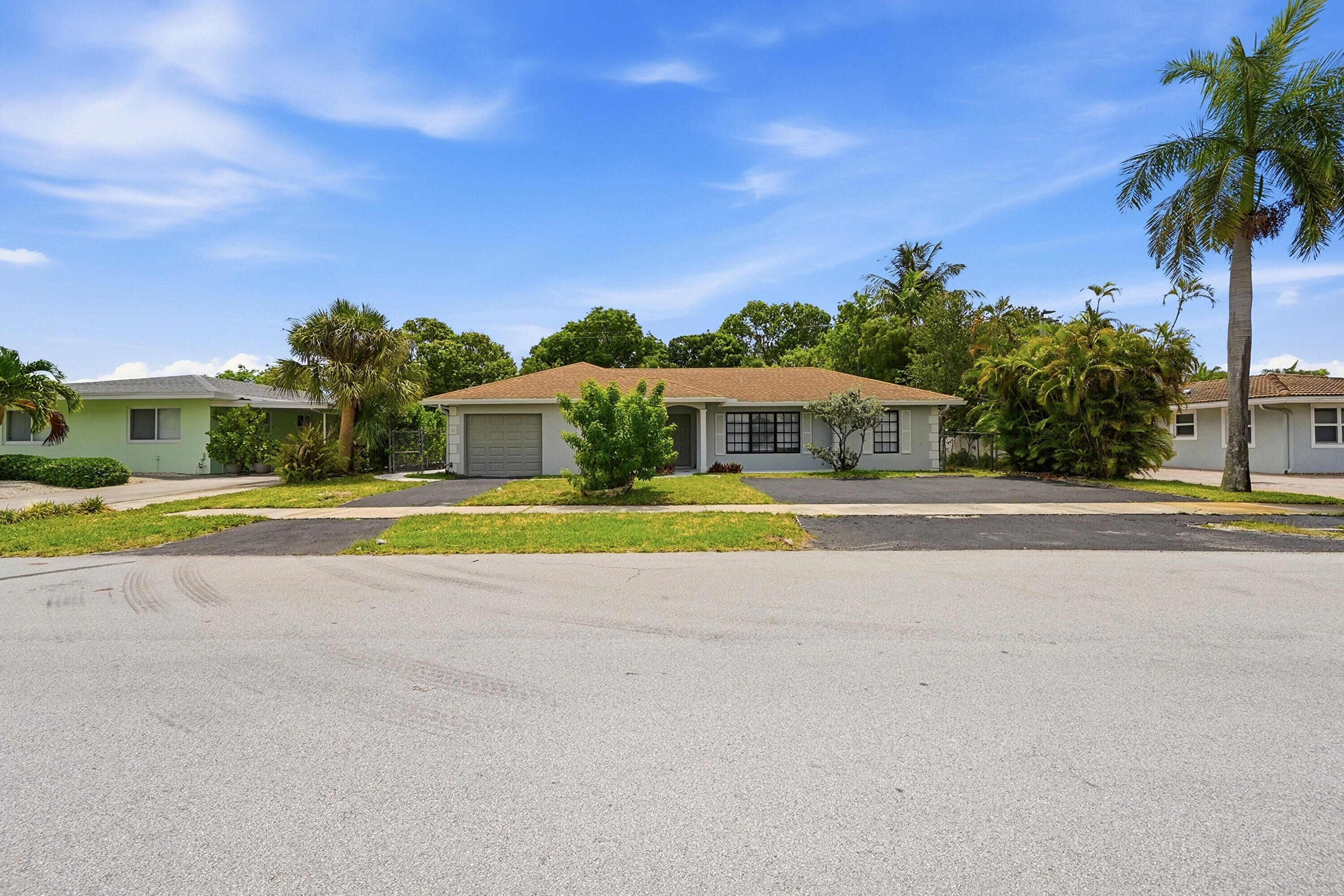 RARE INVESTMENT OPPORTUNITY IN DEERFIELD BEACH! Just 1 MILE FROM THE OCEAN, this FULLY RENOVATED DUPLEX with POOL. Excellent investment opportunity with strong rental demand. The property has a brand new kitchen featuring quartz countertops, new cabinets, sink, updated bathrooms, new flooring, 2014 roof. A great opportunity for investors seeking immediate cash flow and solid income producing Property. Prime location with strong rental demand and long-term or Airbnb appreciation potential. This property is ideal for an owner occupant on one side and collecting rent on the other or a vacation rental being close to everything. Schedule a showing today to make this ideal property with NO HOA fees or restrictions and endless investment potential yours! RARE INVESTMENT OPPORTUNITY IN DEERFIELD BEACH! Just 1 MILE FROM THE OCEAN, this FULLY RENOVATED DUPLEX with POOL. Fully renovated duplex just 1 mile from the beach in desirable Deerfield Beach. Excellent investment opportunity with strong rental demand. The property has been extensively updated with a new kitchen featuring quartz countertops, new cabinets, sink, updated bathrooms, new flooring, 2014 roof. A great opportunity for investors seeking immediate cash flow and solid income producing property.Prime coastal location with strong rental demand and long-term or Airbnb appreciation potential. Ideal for investors looking for immediate cash flow in a highly desirable area. This property is ideal for an owner occupant on one side and collecting rent on the other or a vacation rental being so close to everything...grocery stores, shopping, gym, restaurants, beach and much more!. The outdoor space features separate open patios and fenced-in backyard space for kids to play, pets to run and to entertain hosting parties or backyard BBQs with friends & family year round. Close to everything in the heart of East Deerfield Beach ONLY 1 mile from Boca Raton, the Intracoastal waterway and THE BEACH! Conveniently situated minutes from Deerfield Beach fishing pier & boardwalk featuring countless events highlighting culture, music, dance, art and nature in close proximity to popular retailers like Trader Joe's, Sprouts, Target, a wide array of fine dining & casual restaurants, gyms, community parks and schools. Also just a stone's throw away from the iconic Hillsboro Lighthouse, many marinas, boating/watersports, public & private golf courses and family entertainment with easy access to US1, I-95, the FL Turnpike and a short drive to Fort Lauderdale-Hollywood International Airport and the new Brightline train with service between Miami and Orlando. Schedule a showing today to make this ideal property with NO HOA fees or restrictions and endless investment potential yours!