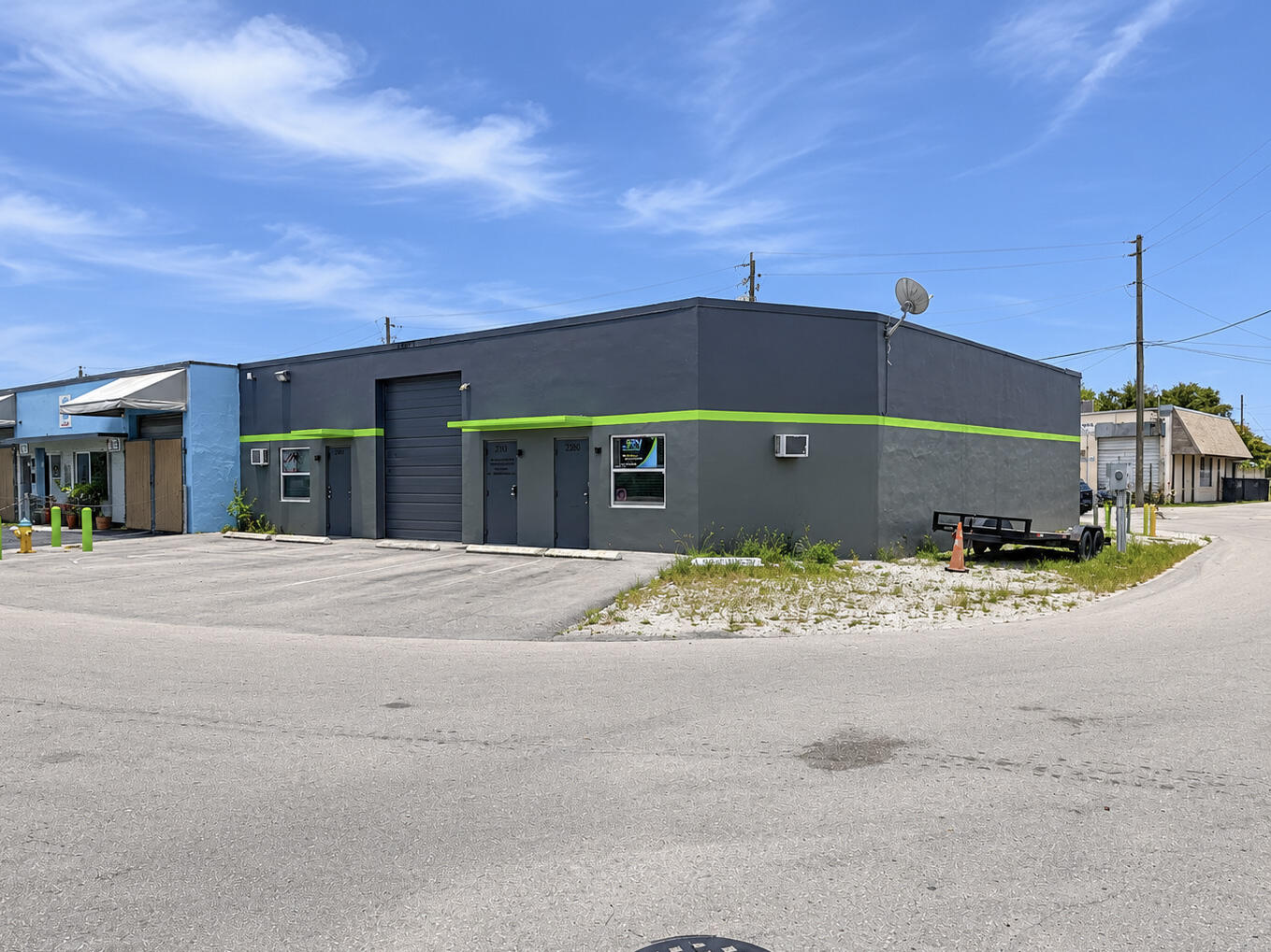 Fantastic Find! DMV APPROVED ! Approximately 2,200+/- Sq. Ft. Of Warehouse With Three 10-Foot Grade-Level Bay Doors, Private office, Two Bathrooms, 12-14-Foot Ceilings. Zoned B-3,  The 14-Foot Ceilings Provide Excellent Vertical Clearance For Storage, Equipment, Or Business Operations. Conveniently Located Just Minutes From I-95 And Florida's Turnpike. Water Included in Gross Monthly Rent Of 4995. CARLIFTS ARE NOT INCLUDED.