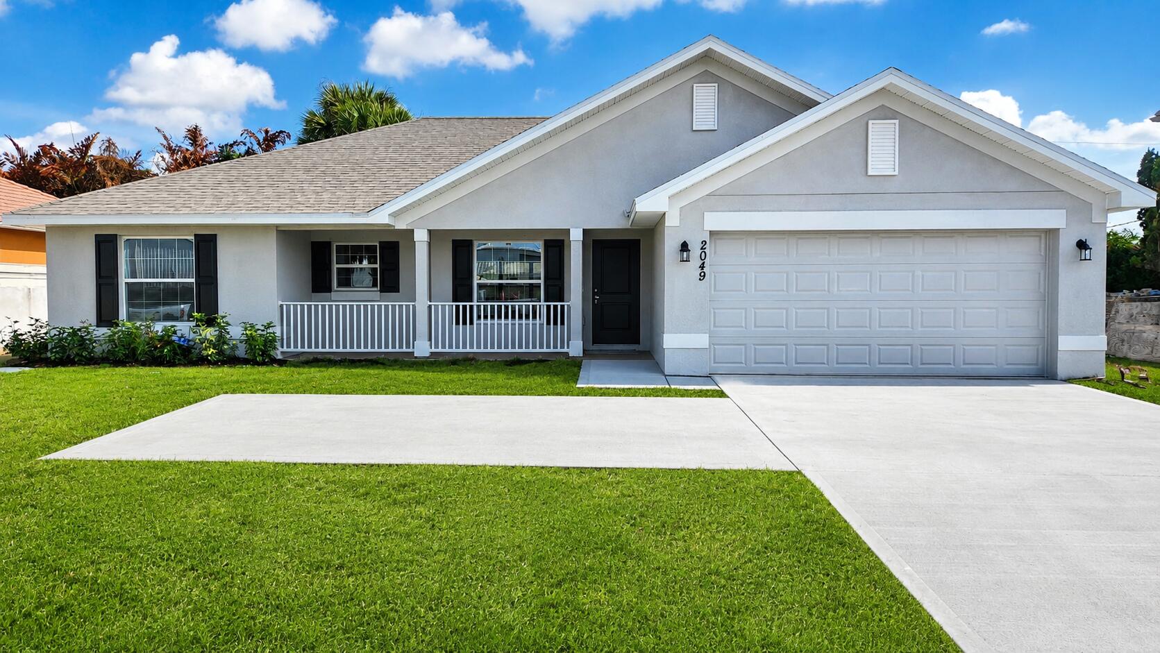 ONLY $1,000 DEPOSIT. Save yourself several thousands of dollars in CLOSING COSTS & LOW RATE OPTIONS WHEN USING THE SELLER'S APPROVED LENDER. Your new home is MOVE IN READY. It features 3 bedrooms, 2 bathrooms, a walk in shower and a 2-car garage with vaulted ceilings, a cute front porch, tile in main living areas and a large fenced-in backyard view from your covered patio. Offering quick access to shopping, dining, parks, beaches & Treasure Coast Mall. Monthly payments starting at $3,100 P&I ONLY. Builder warranty Included