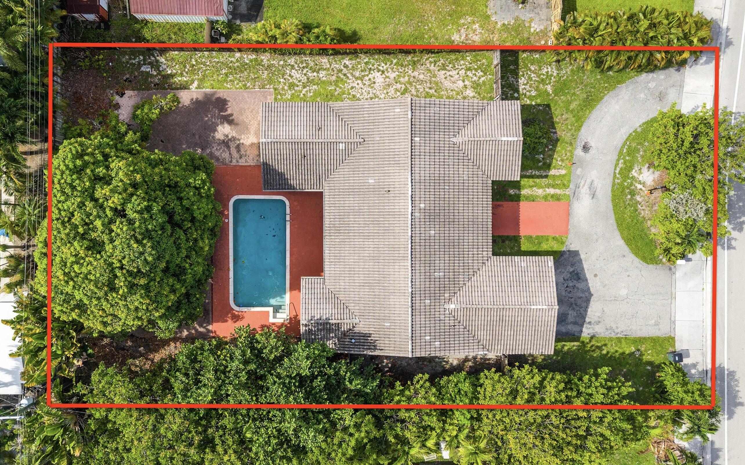 Prime East Boca opportunity! This 6 bedroom, 4 bath pool home sits on an oversized 0.37-acre lot offering incredible potential for investors, builders, or buyers looking to create their dream home. Renovate the existing residence or explore the possibilities of new construction. The garage conversion provides additional living space and can easily be converted back to a garage. Unbeatable location near FAU, Mizner Park, major highways, beautiful beaches, parks, shopping, dining, and A-rated schools. Call today to schedule a showing.