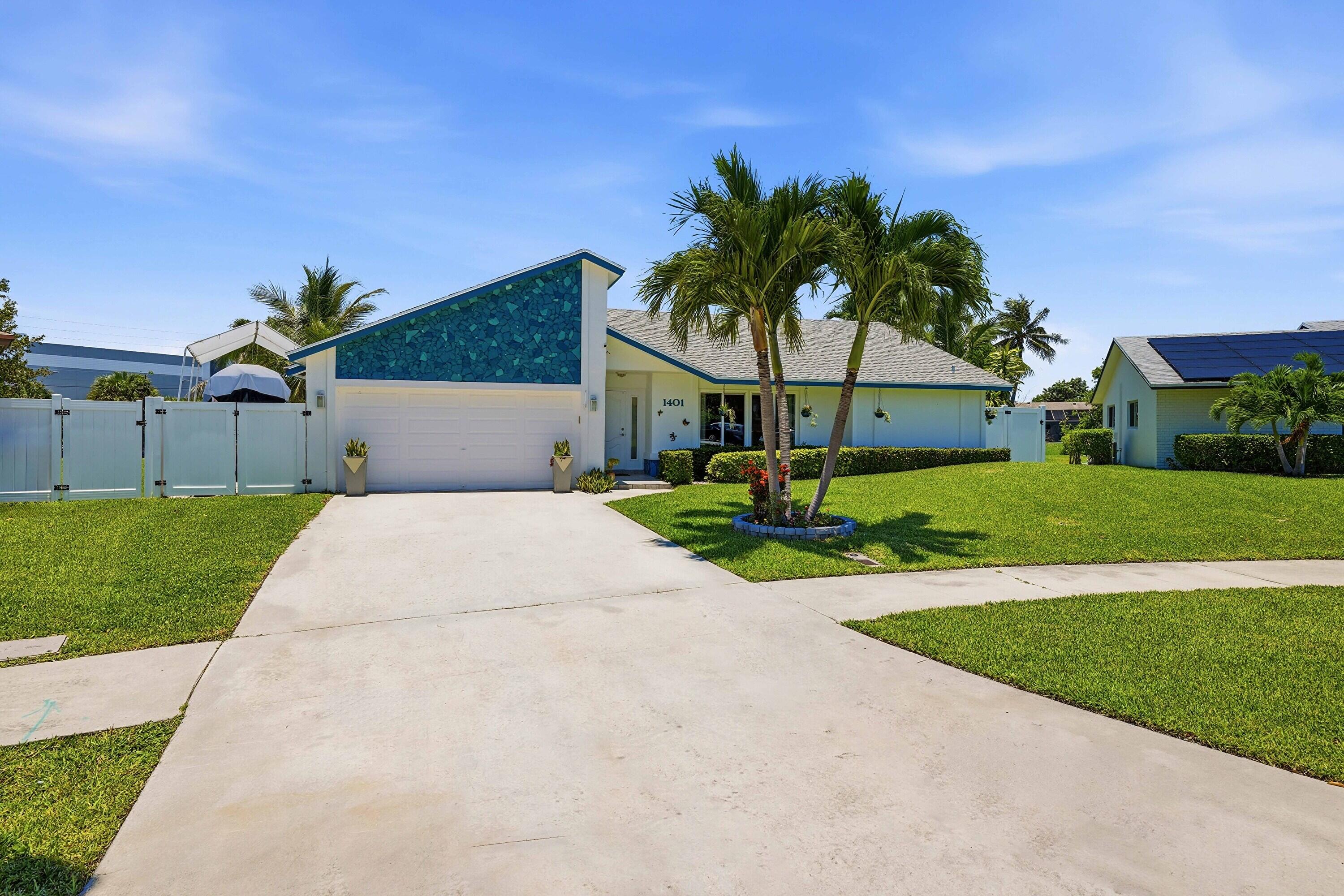 This well-maintained 3-bed, 2-bath CBS pool home sits on one of the largest pie-shaped waterfront lots in the highly desirable NO HOA community of Crystal Heights. From the moment you enter, you're greeted by expansive water views and vaulted wood ceilings that create an open, airy feel throughout the main living areas. Situated on a wide waterfront lot, this property offers exceptional outdoor space for entertaining, relaxation, boating, fishing, and even city compliant RV/boat storage. Enjoy a fully fenced backyard (2025 PVC fencing) with a pool, spa with propane heating system, and a screened patio, perfect for seamless indoor/outdoor living. Inside, the home features a split bedroom floor plan, hardwood floors and ceramic tile throughout, and an updated kitchen with black granite countertops, cedar cabinetry, dual pantries, and new stainless steel appliances. The spacious primary suite offers tranquil water views, patio access, a large walk-in closet, dual vanities, and a separate shower/water closet. Major upgrades providing peace of mind and efficiency include: Brand new 3.5-ton HVAC (2026), full impact windows and doors (double insulated & tinted), solar water heater, RainSoft whole-home water filtration + iSpring 4-stage reverse osmosis system, variable speed Pentair pool pump (2025), roof cleaned & exterior painted (2026), and new shed for additional outdoor storage. Additional features include a dedicated laundry room, spacious secondary bedrooms with large closets, and abundant natural light throughout. Located just minutes from I-95, the Turnpike, Sawgrass Expressway, Deerfield's award winning beaches, The Cove, Coconut Creek Promenade, Mizner Park, and Boca Town Center. Conveniently positioned near major transit including Brightline Boca Station (15 min), FLL (25 min) and MIA (45 min) International Airports. This is a rare opportunity to own a move-in-ready waterfront home with land, privacy, no HOA restrictions, and valuable upgrades in one of South Florida's most sought after neighborhoods. Schedule your private showing today and make this beautiful home yours! Please see brokers remarks for more information.