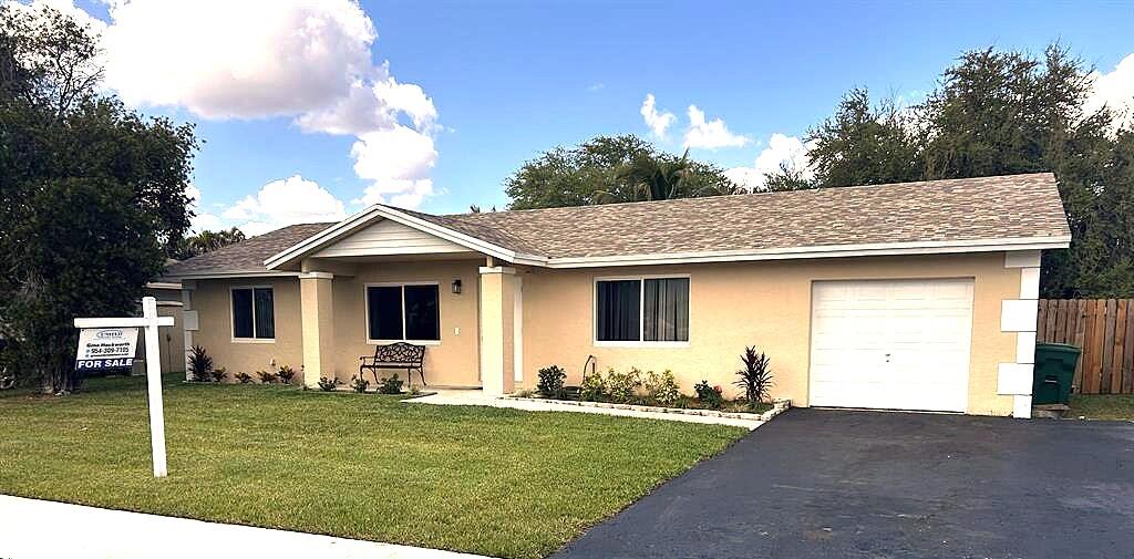 NO HOA! If you are searching for a clean, well-maintained home without the restrictions or payment of a Homeowners Association, this property is must-see. 3 bedroom, 2-bath layout with an extra room off of the kitchen that could easily be a fourth bedroom or a family room. Remodeled bathrooms, new flooring in all bedrooms, ceramic tile in main living areas. Safety-enhanced features such as impact windows and doors and a brand-new roof (2025). Oversized backyard provides ample space for outdoor activities. Concrete patio would be perfect area for a screen patio or a Pergola. Access to excellent schools, from elementary through high school, makes this home ideal for families. The location is convenient to all amenities and Highways