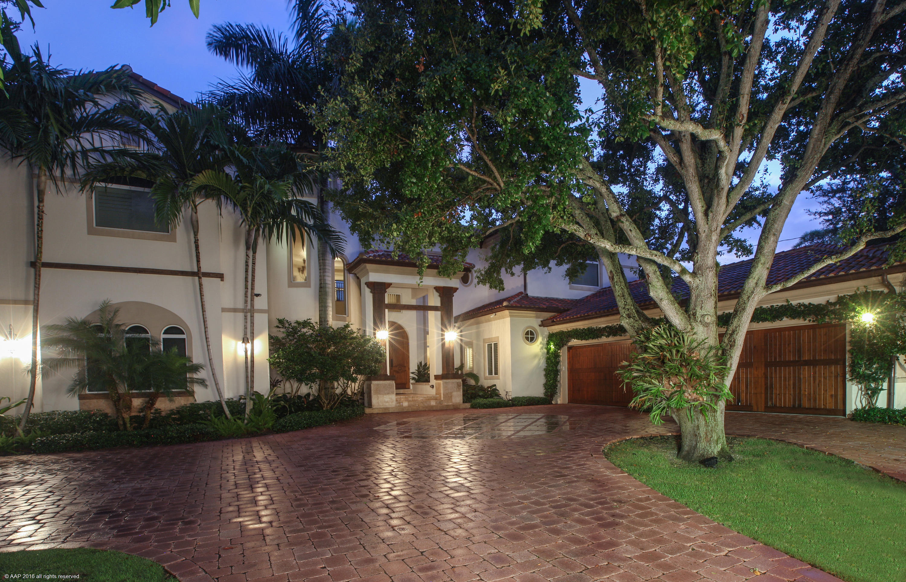 Don't miss this opportunity to purchase your very own private tropical oasis on almost an acre with 100 feet of water-frontage on the Loxahatchee River.  This Mediterranean style home boast over 7,500+ sq ft of living space which includes 5 bedrooms, an office, an additional workout/playroom, theater, game room and a sit down bar.  Outside, there are 4 private patios with breathtaking views of the river.  There is also a multi-purpose outdoor sport court for added recreation. 

This home features hand-scraped hardwood floors, travertine flooring, soaring ceilings, spacious bedrooms and finely carved pillars with beautiful craftsmanship throughout.  Stunning views of the Loxahatchee River can be seen from almost any room in the house! You will feel as if you are at your own very personal resort as you enjoy all the outdoor amenities this home has to offer. Cool off in the salt-water infinity pool or relax in the hot tub, host a cookout with the outdoor kitchen, or entertain guest as you relax around the fire pit.  Feel free to catch some sun on the private beach or fish off of this private dock.  You may even take your boat out for a spin.  Whatever you decide to do, this beautiful home is perfect for entertaining and enjoying the outdoor life Jupiter has to offer!
