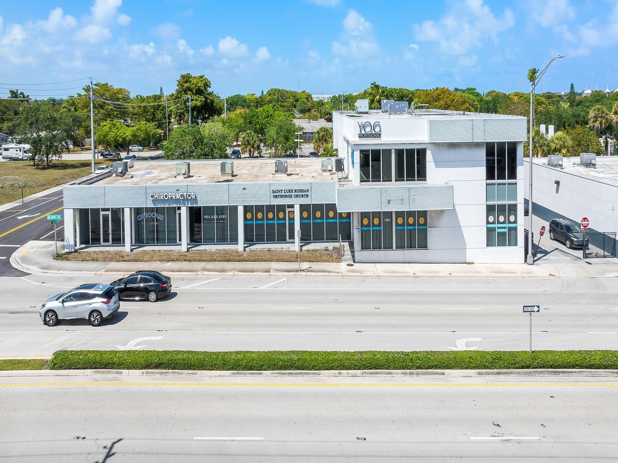 Located in the heart of Pompano Beach's commercial corridor, this recently updated property offers exceptional visibility and exposure along a major thoroughfare. The existing layout supports assembly, office, retail, showroom, educational, wellness, and other commercial uses, subject to applicable approvals. Floor-to-ceiling glass storefront windows provide abundant natural light and create an inviting environment while maximizing display and branding opportunities. With prominent frontage, excellent signage potential, and traffic counts exceeding 40,000 vehicles per day, the property delivers outstanding visibility for businesses seeking a strong presence in a high-traffic location. Ideal for creative offices, boutique retailers, wellness concepts, and professional service providers.