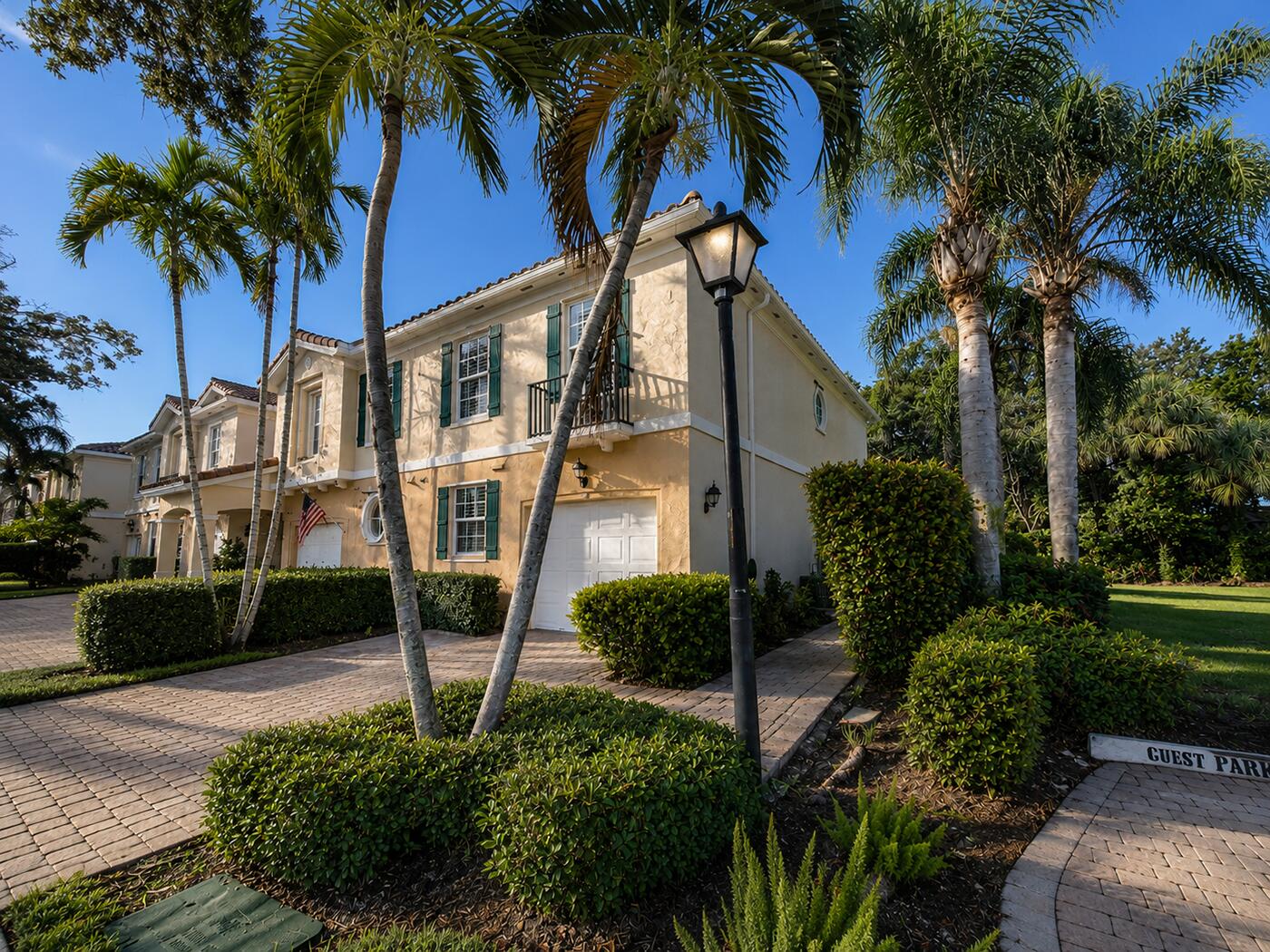 Welcome to this beautifully updated home with new 2023 roof & paint in the desirable community of Catalina Lakes. Adjacent to a green space with convenient guest parking, added privacy and an open feel that's hard to find. Inside, you'll appreciate the custom plantation shutters and elegant imported Italian porcelain flooring throughout the first floor, while luxury vinyl plank wood flooring extends across the stairs and second level for a warm, modern look. The remodeled primary bathroom provides a spa-inspired retreat with Italian tile that extends into the primary suite.  Additional improvements include upgraded hurricane-impact windows and sliding glass doors, a 2024 AC system, and an added sound barrier along the adjoining wall for privacy. Upgraded garage shelving / storage. Located in the heart of Palm Beach Gardens, Catalina Lakes offers a wonderful community lifestyle with amenities designed for relaxation, recreation, and connection with neighbors. Residents enjoy a heated sparkling community pool, tennis courts, pickleball courts, and a playground for outdoor enjoyment.  The community's scenic lakes, and sidewalks provide the perfect backdrop for morning strolls or enjoying Florida's beautiful weather. Additional amenities include a beautifully maintained common spaces that create a comfortable and inviting neighborhood atmosphere.  Catalina Lakes is ideally located near the best of Palm Beach Gardens, including exceptional shopping, dining, entertainment, beaches, golf courses, and major roadways. With its convenient location, and resort-style amenities, Catalina Lakes offers the perfect blend of comfort, convenience, and the South Florida lifestyle.