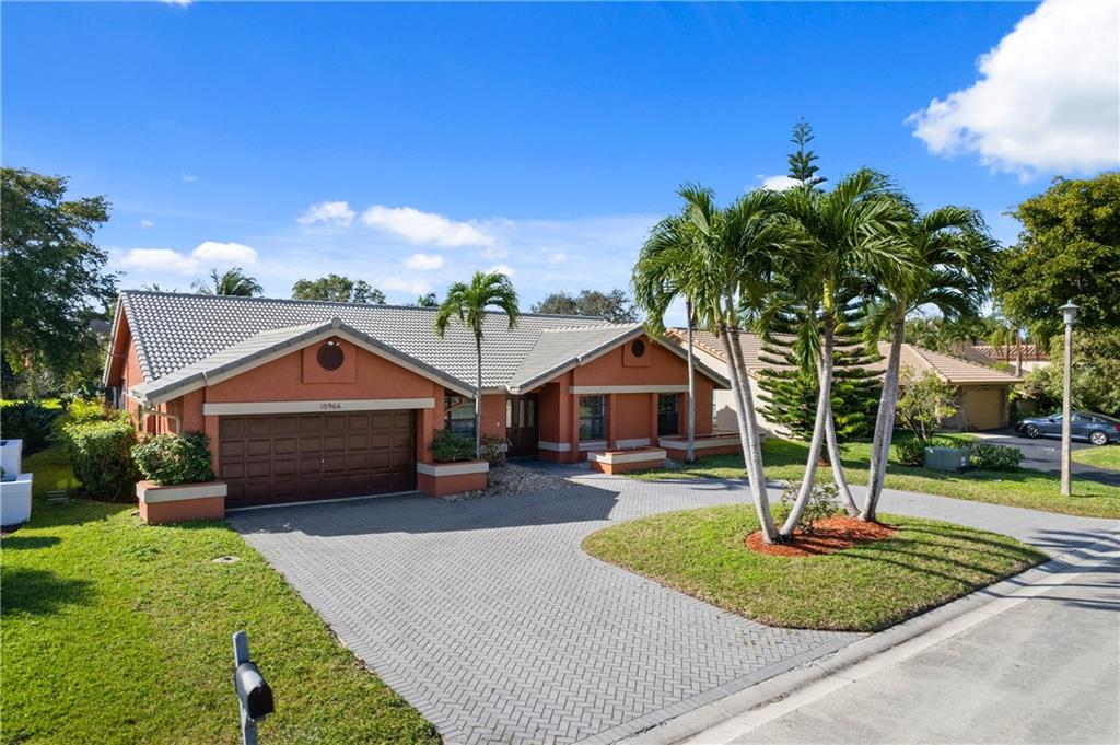 Light and bright 4 bedroom 2 bath pool home with amazing southern exposure and beautiful water views. Tile through living area, open feel with high ceilings plus a screened, huge covered patio make this a great entertaining home! Storm ready with a newer roof and accordion shutter all around. Great schools, walking distance to Cypress & Orchid park.